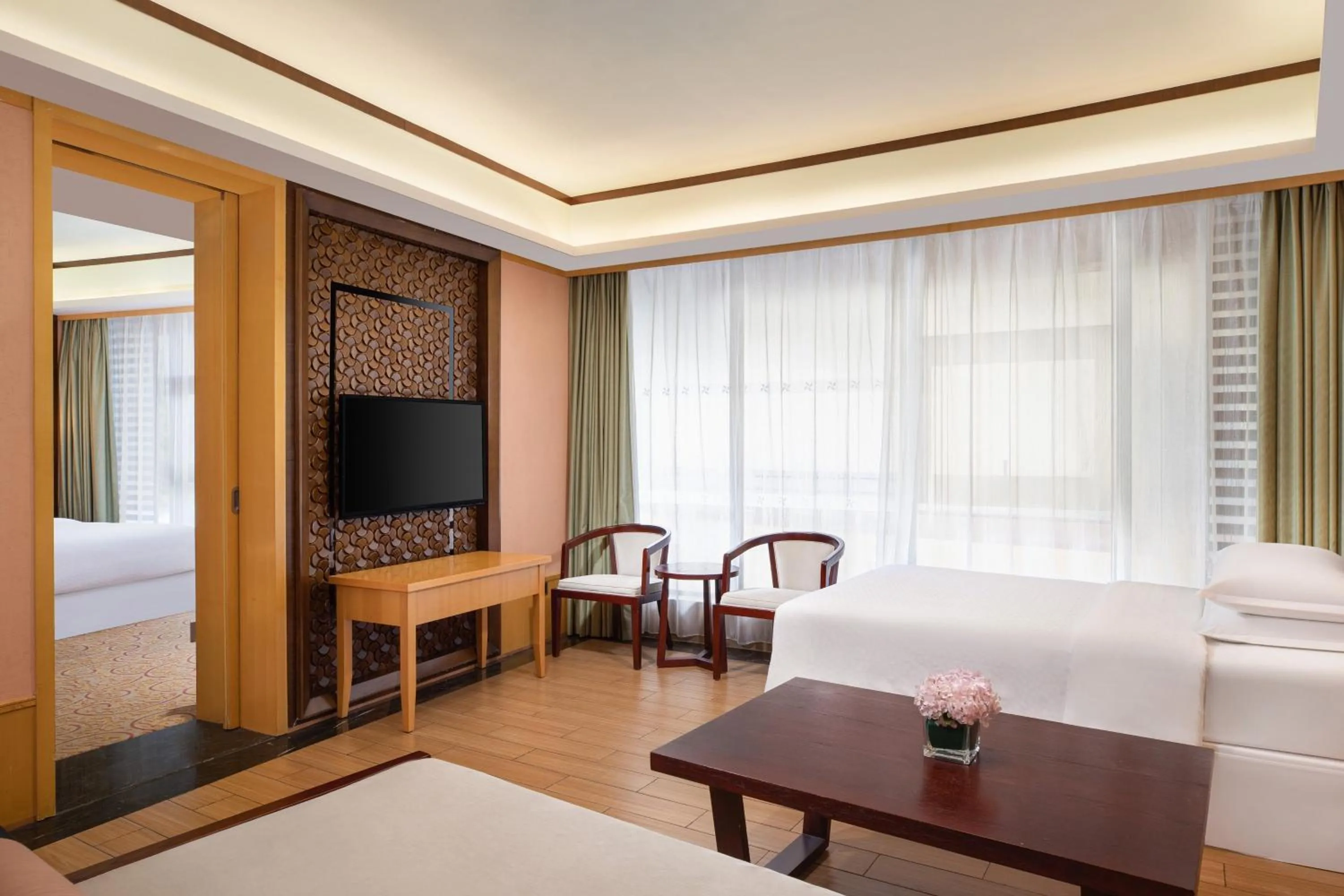 Living room, Bed in Four Points by Sheraton Heyuan Resort
