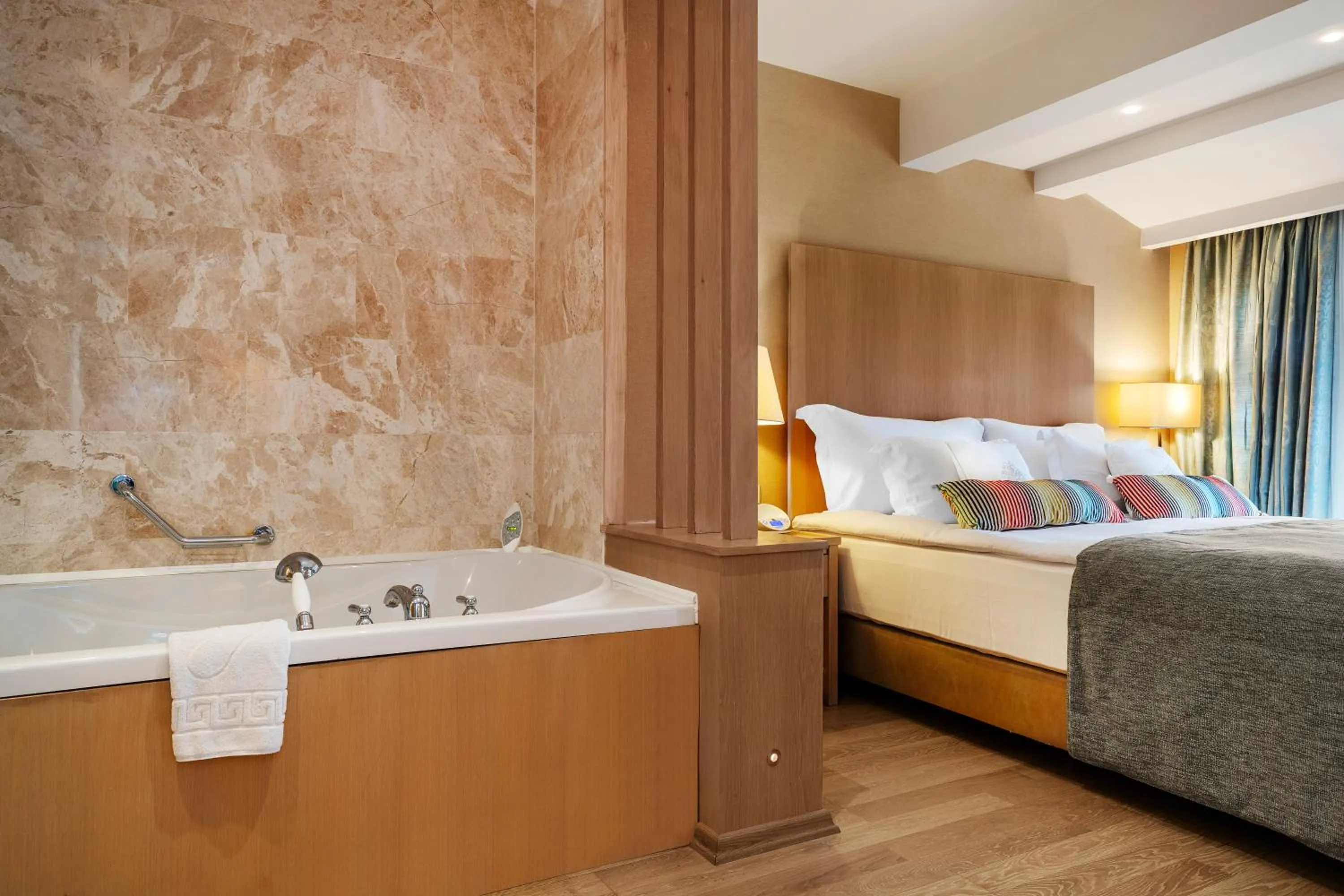 Bed in Marti Resort Deluxe Hotel