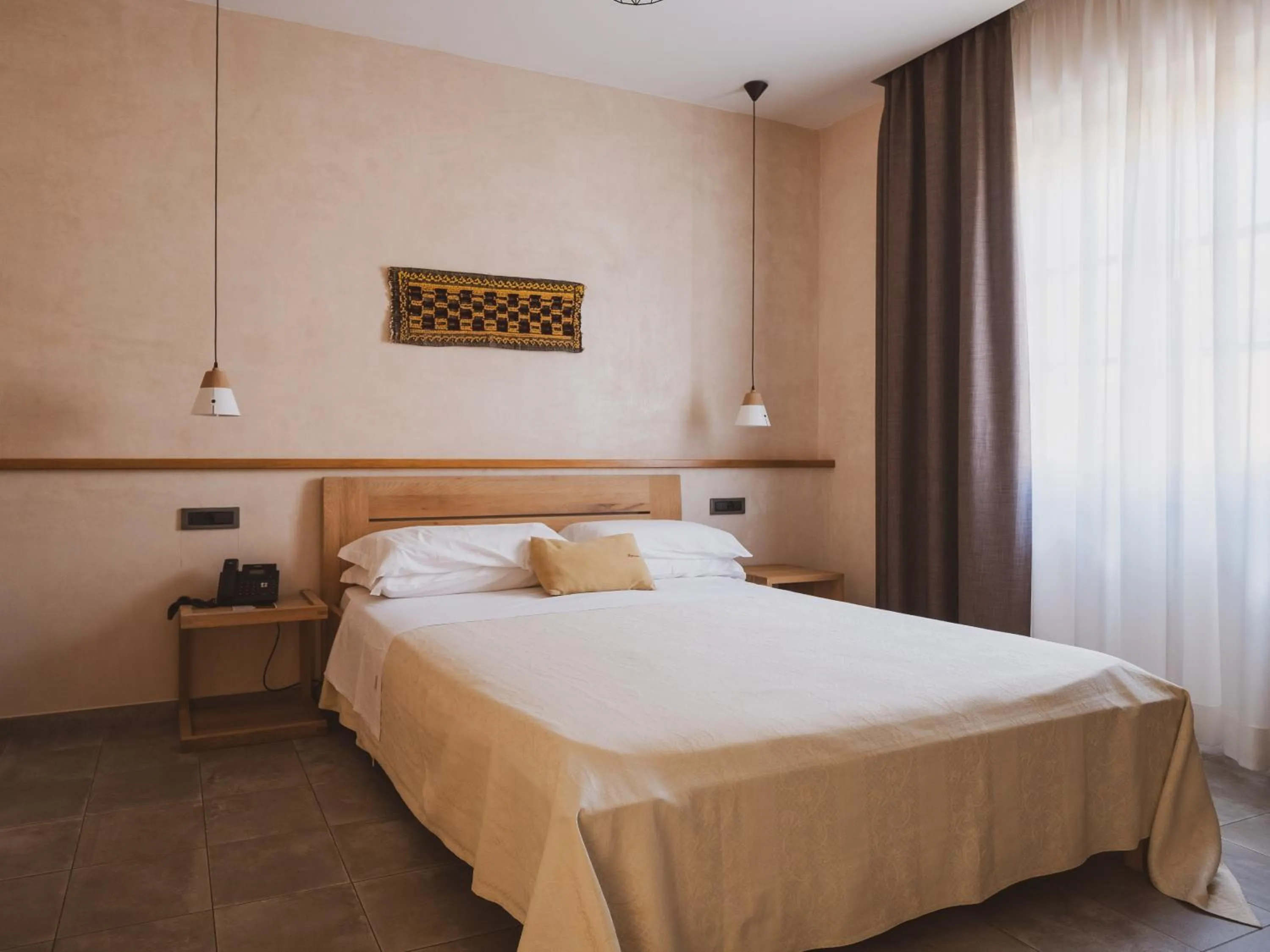 Bed in Tramas Hotel & Spa