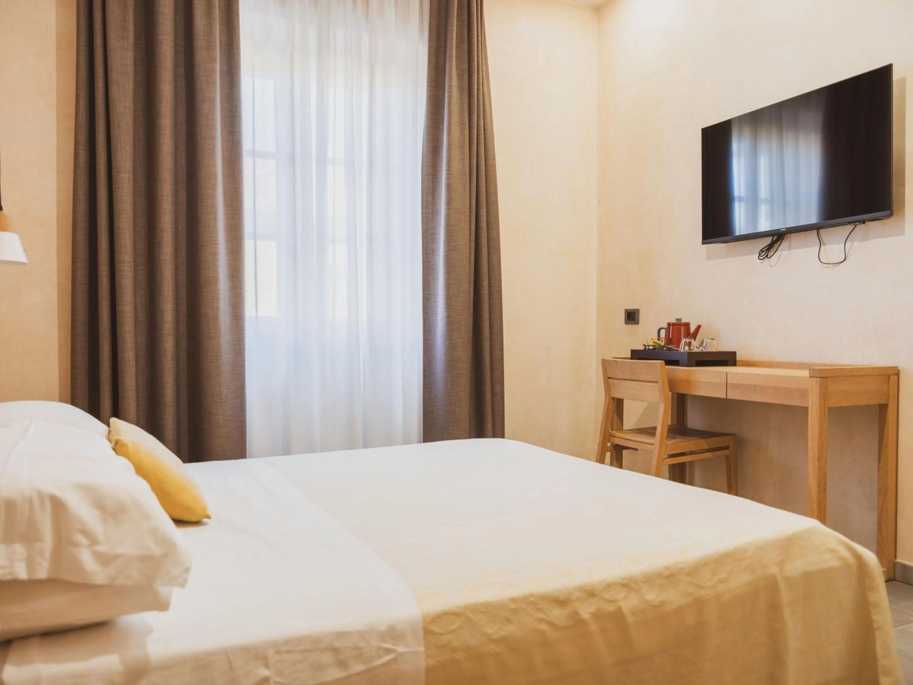 Bed in Tramas Hotel & Spa