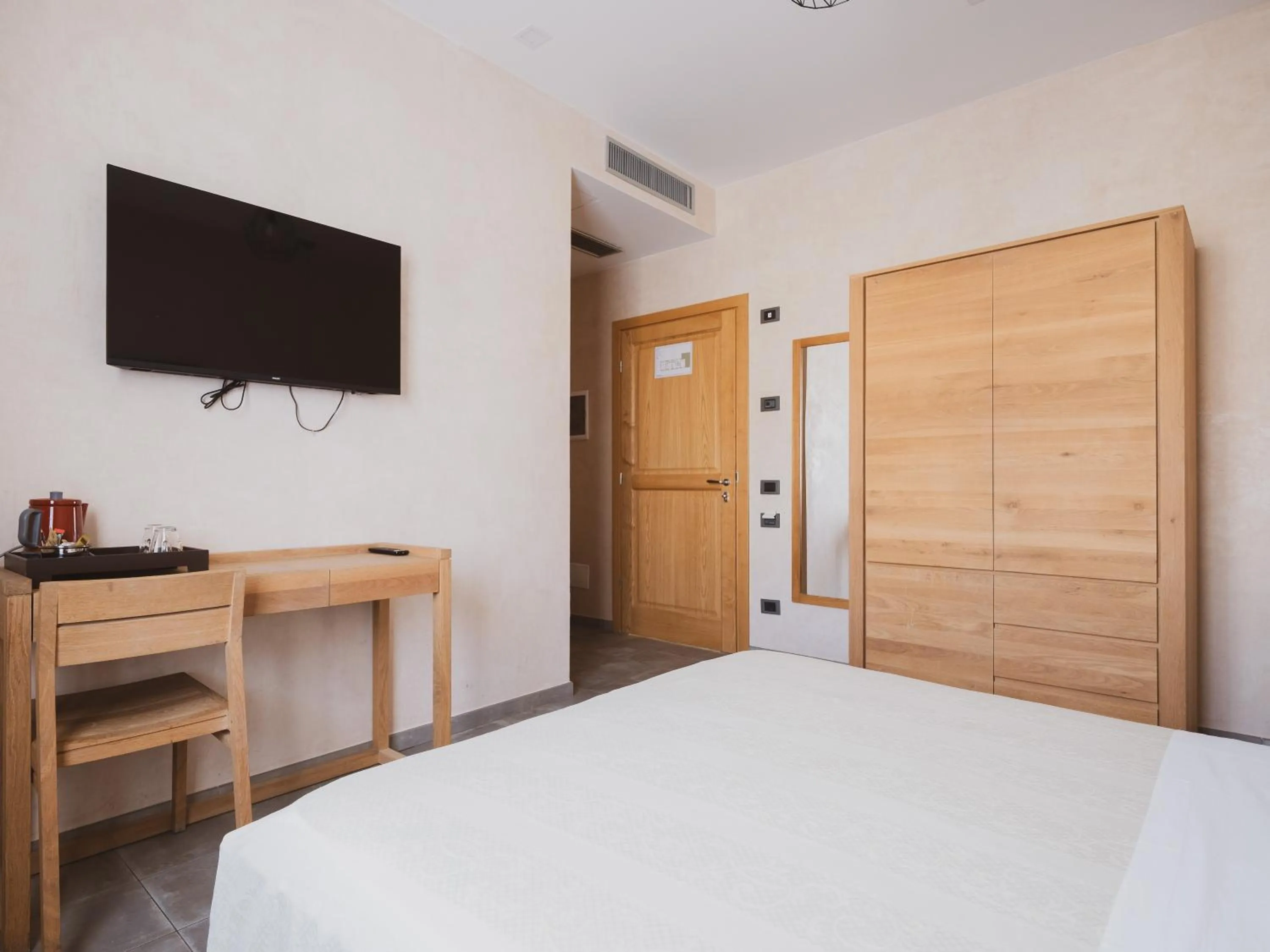 Bed in Tramas Hotel & Spa