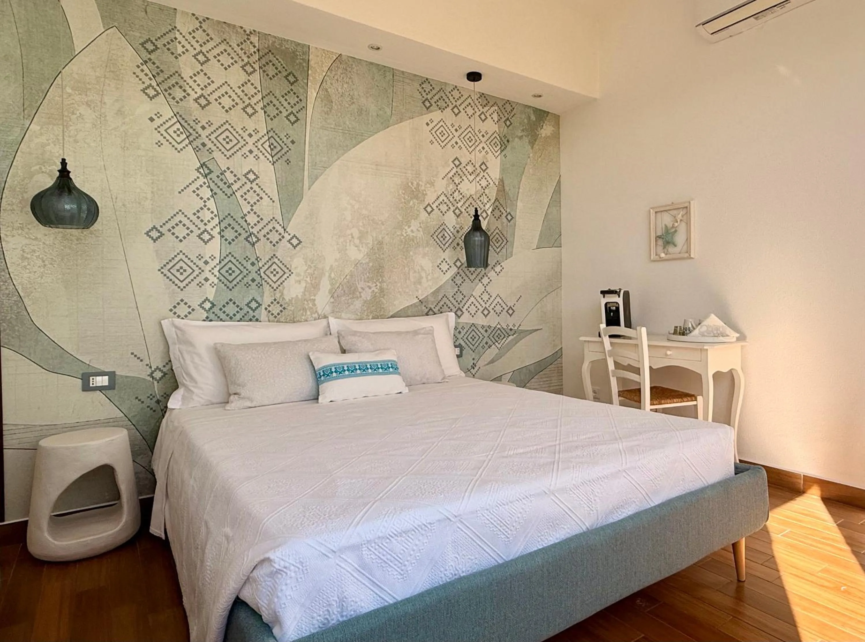 Bed in PALMASERA CHARMING - Rooms & Suites