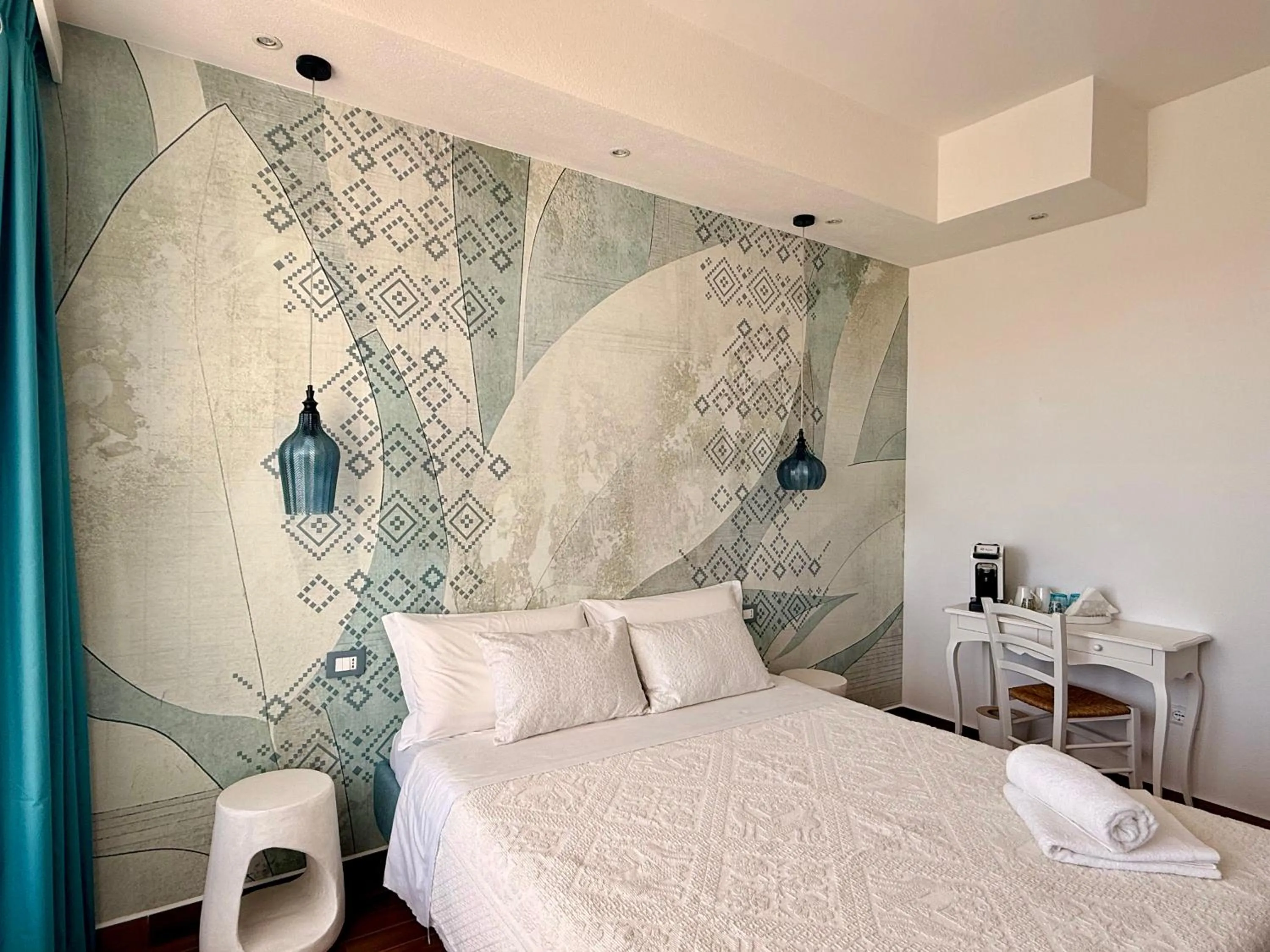 Bed in PALMASERA CHARMING - Rooms & Suites