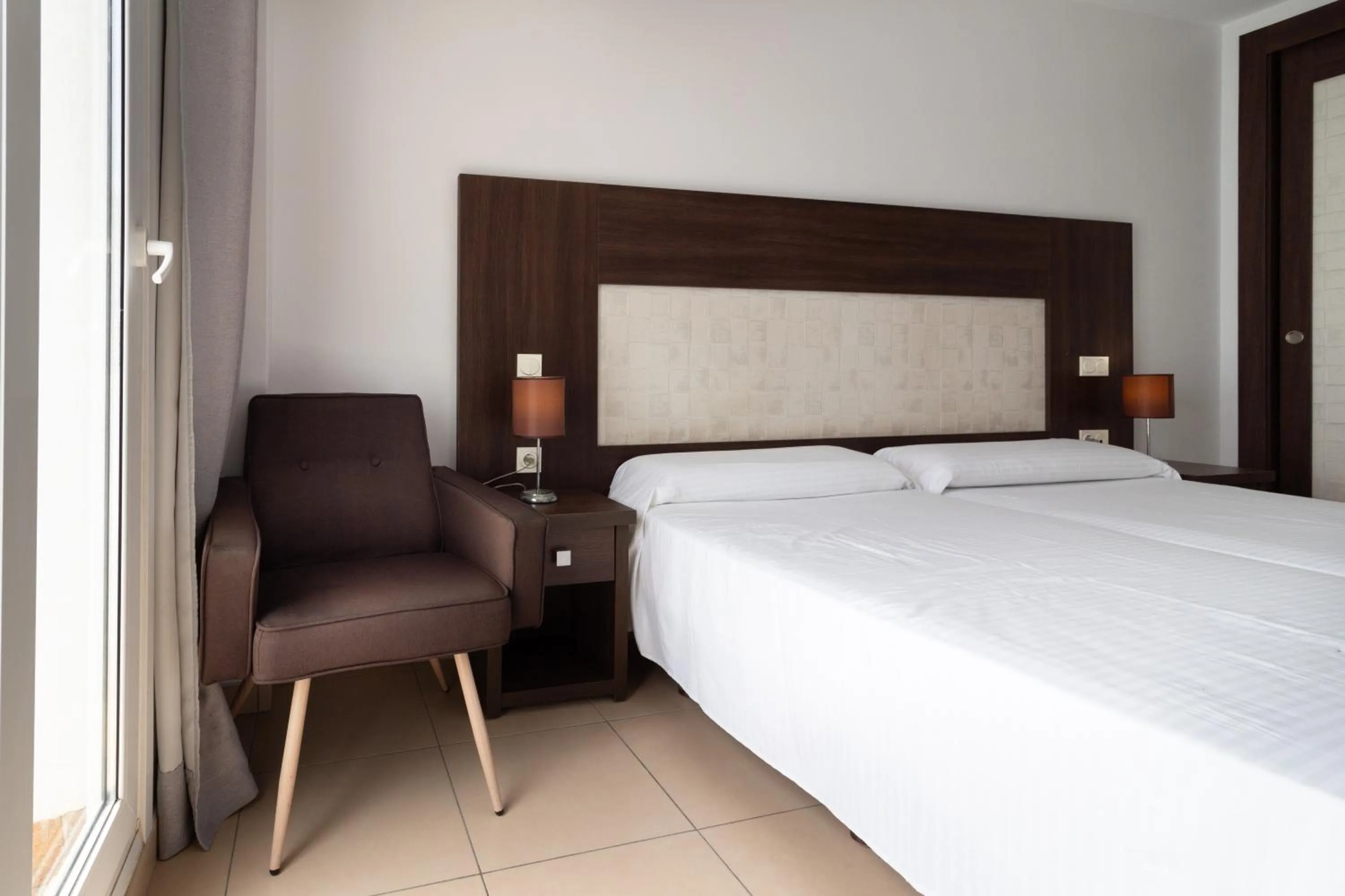 Bed in Hotel Doña Luisa