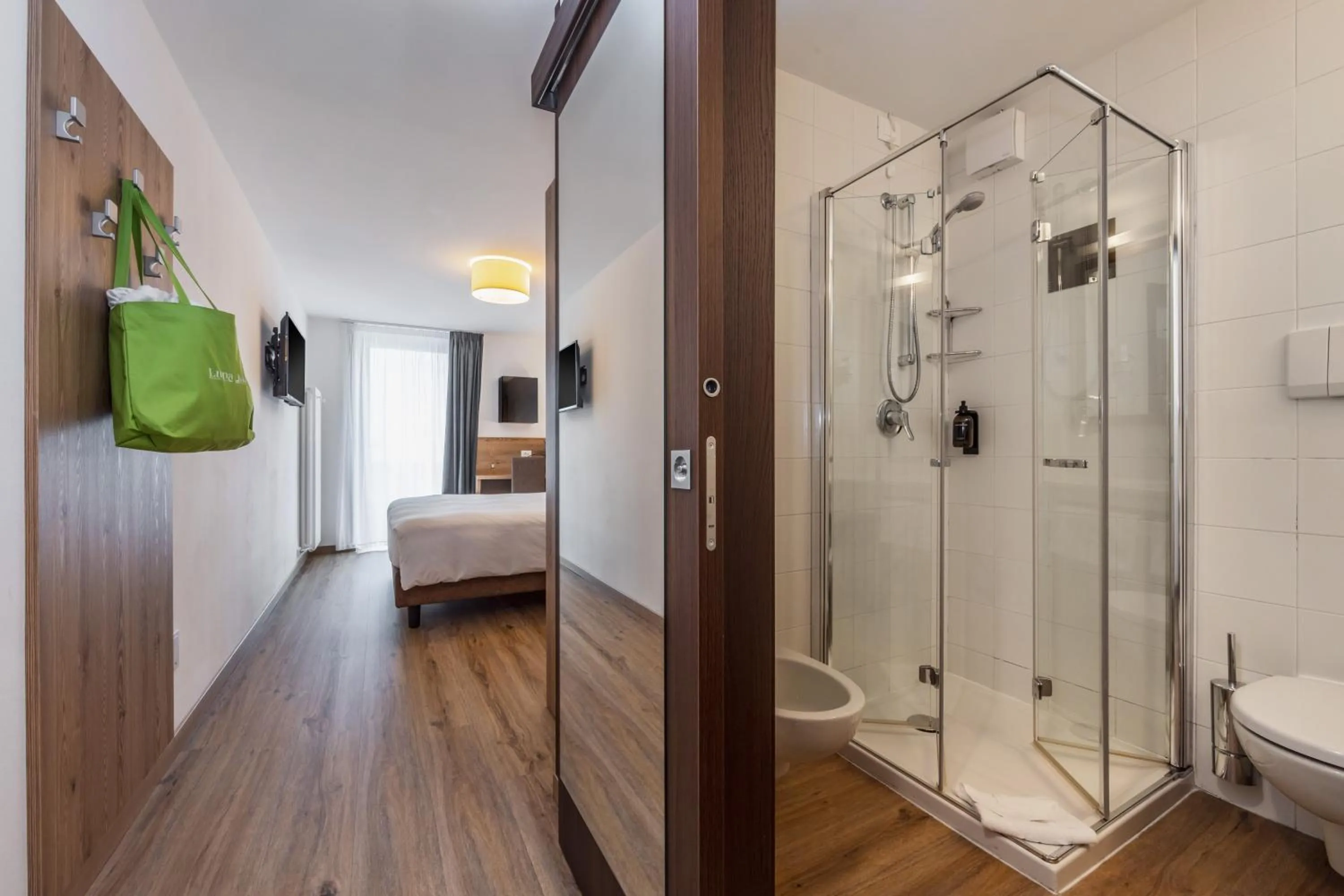Bathroom, Bed in Luna Wellness Hotel