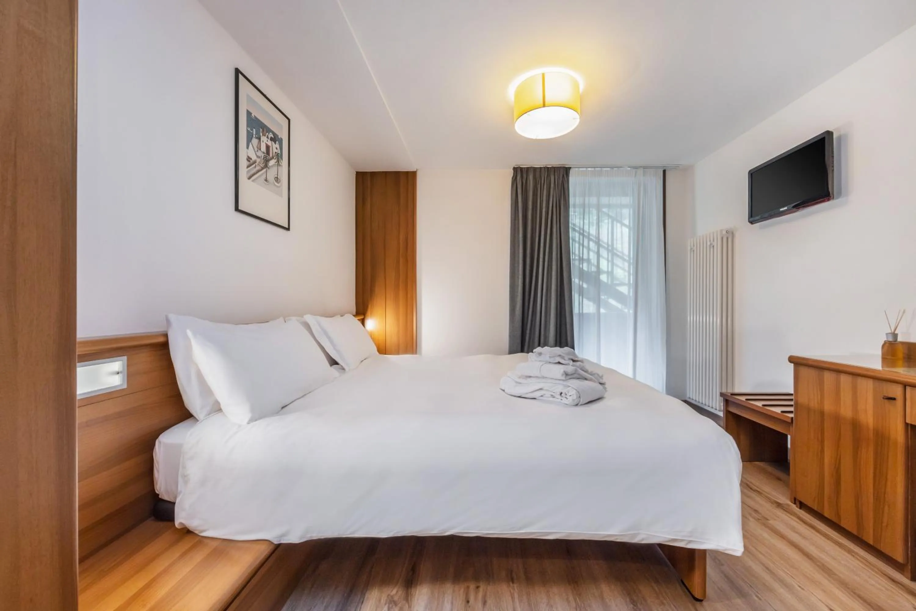 Bedroom, Bed in Luna Wellness Hotel