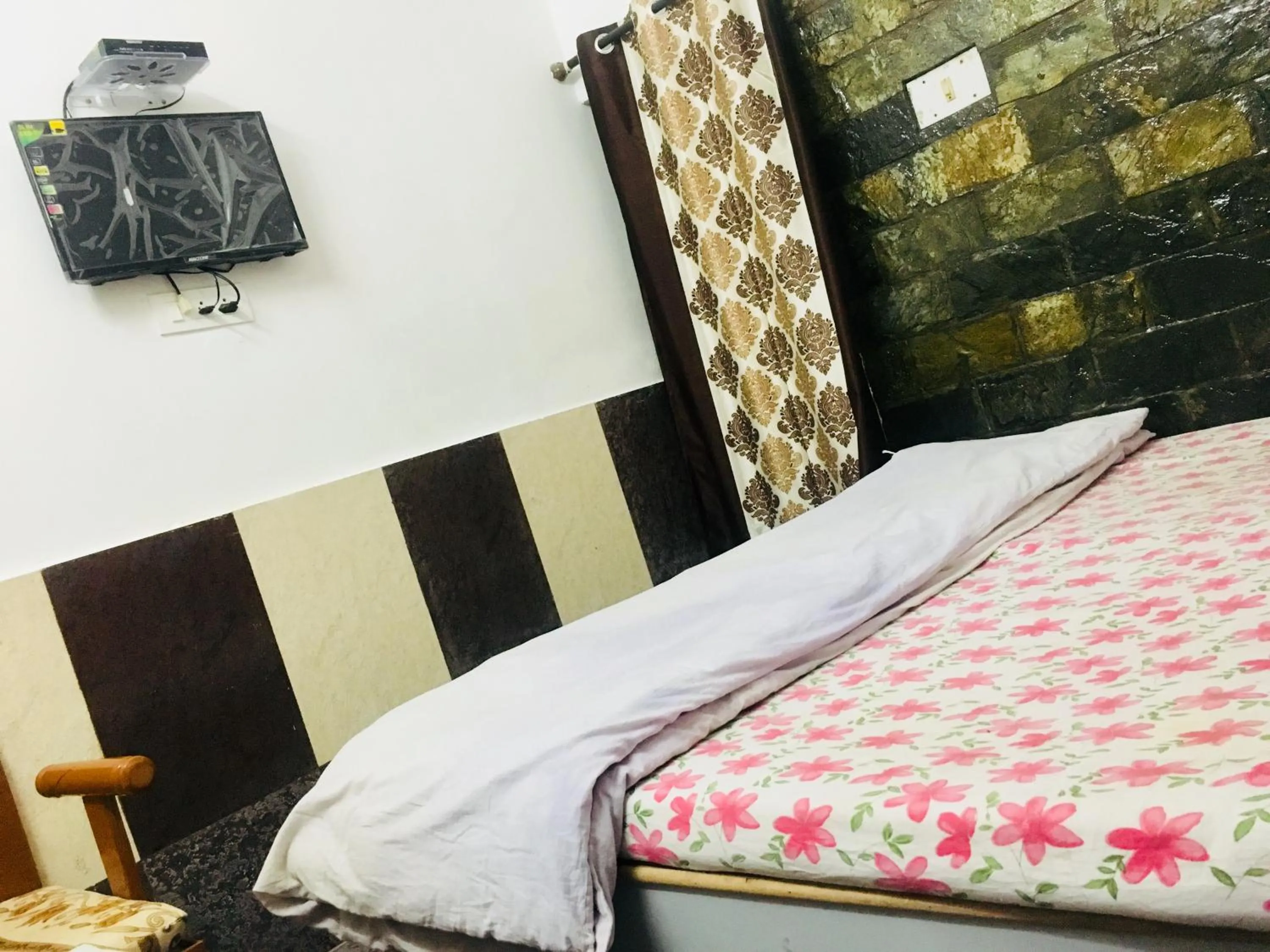 Bed in Hotel Heritage Sanyam