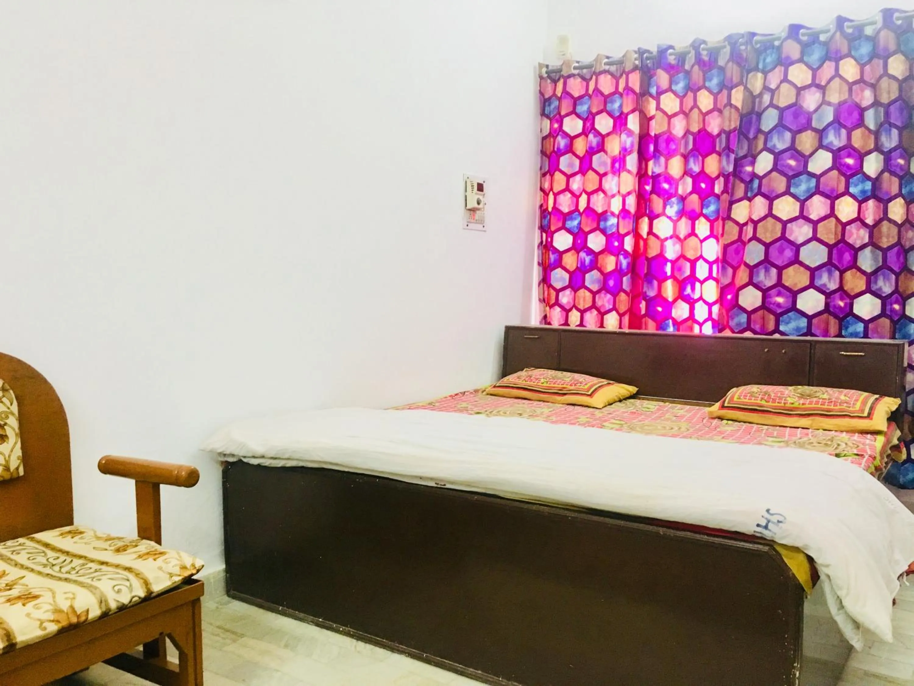 Bed in Hotel Heritage Sanyam