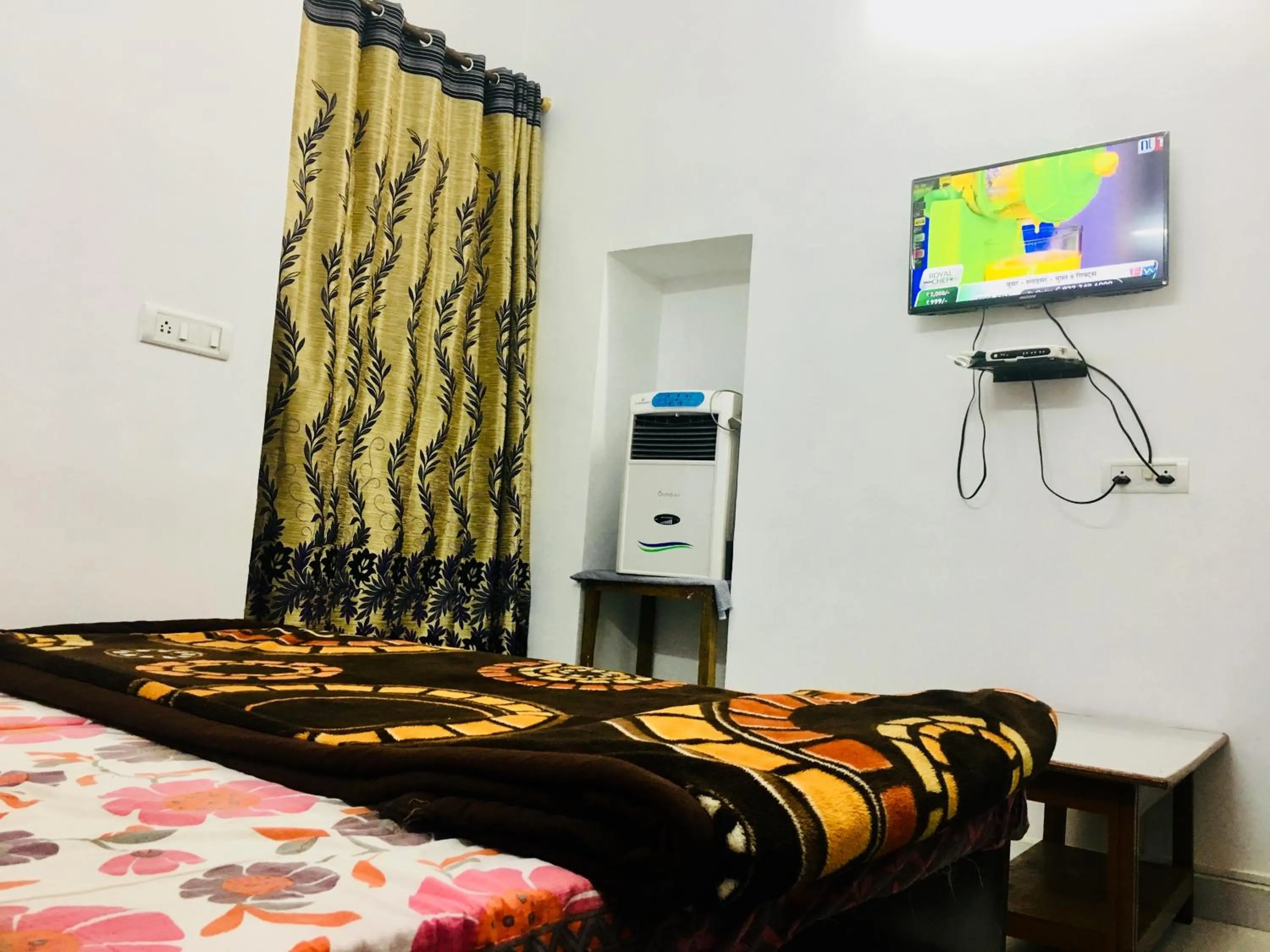 Bed in Hotel Heritage Sanyam