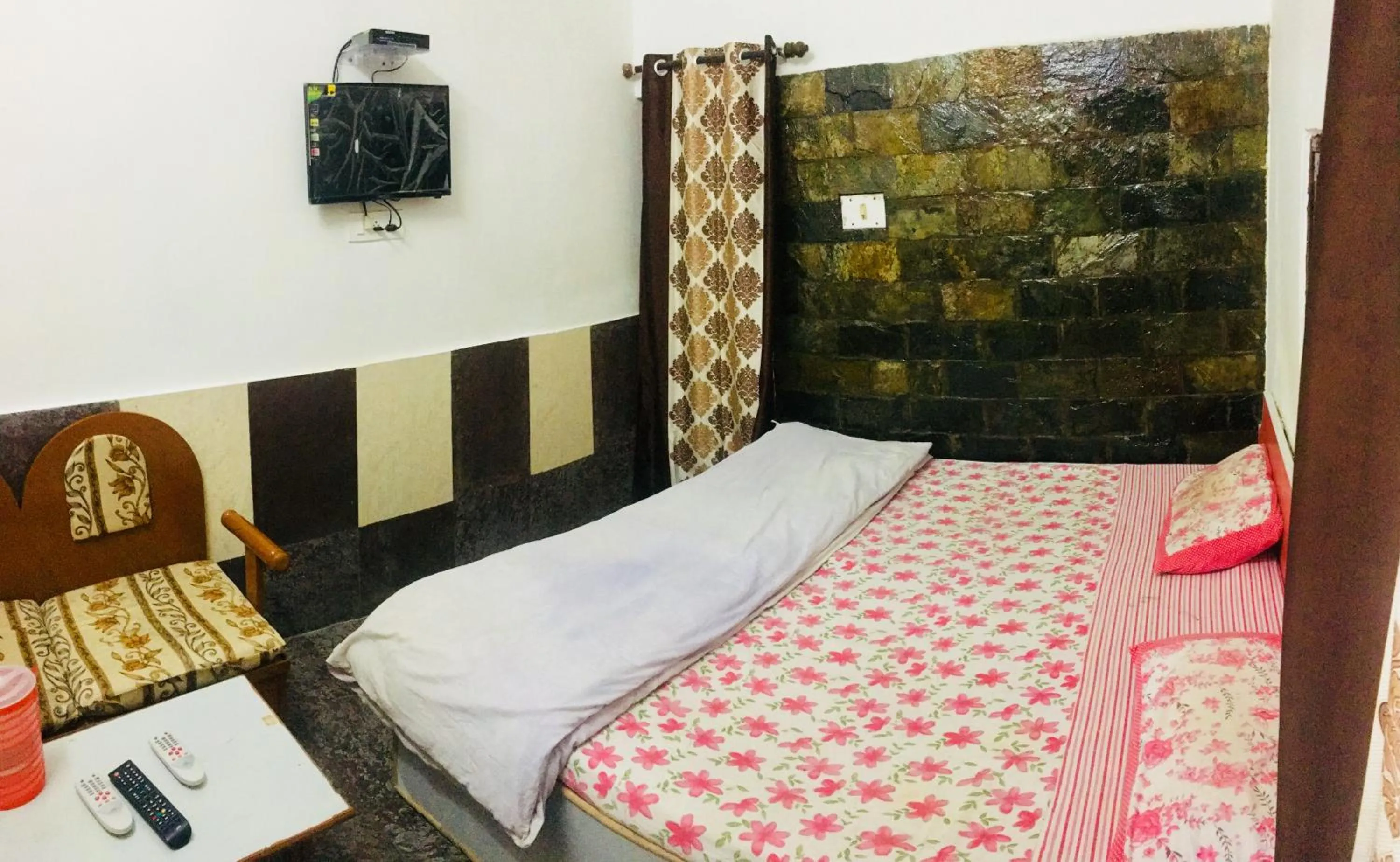 Bed in Hotel Heritage Sanyam