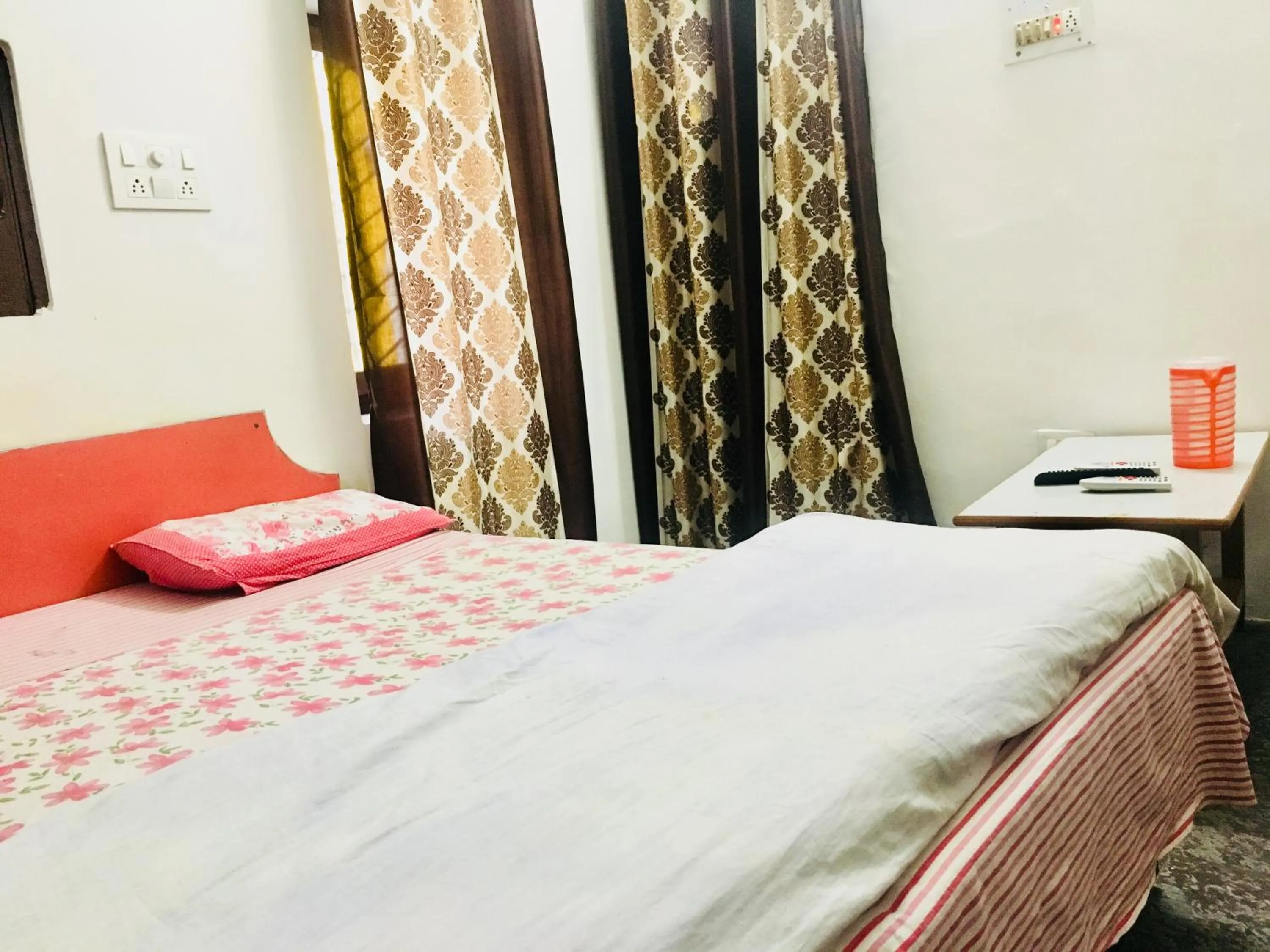 Bed in Hotel Heritage Sanyam