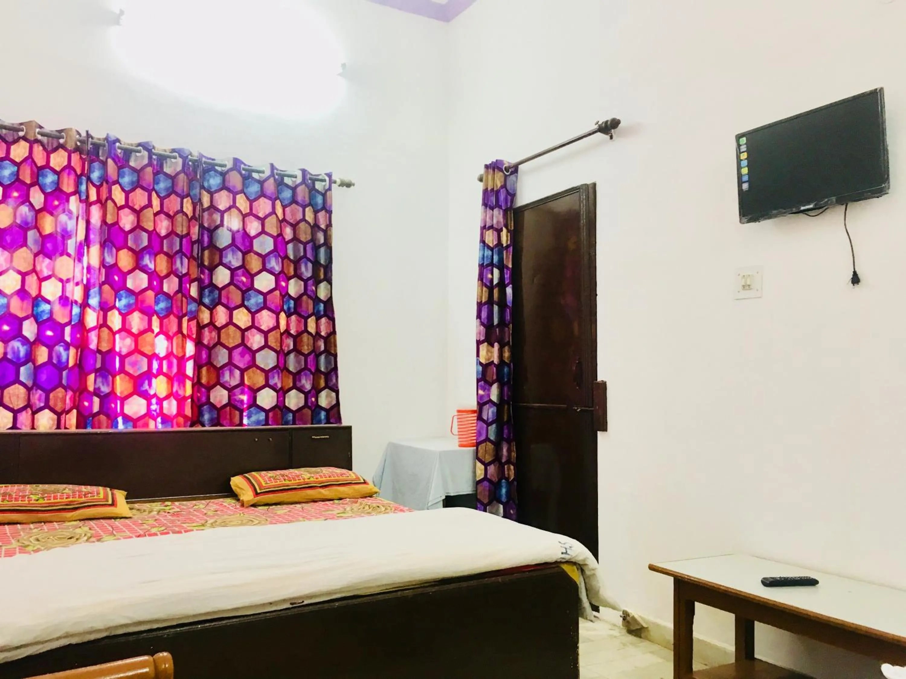 Bed in Hotel Heritage Sanyam