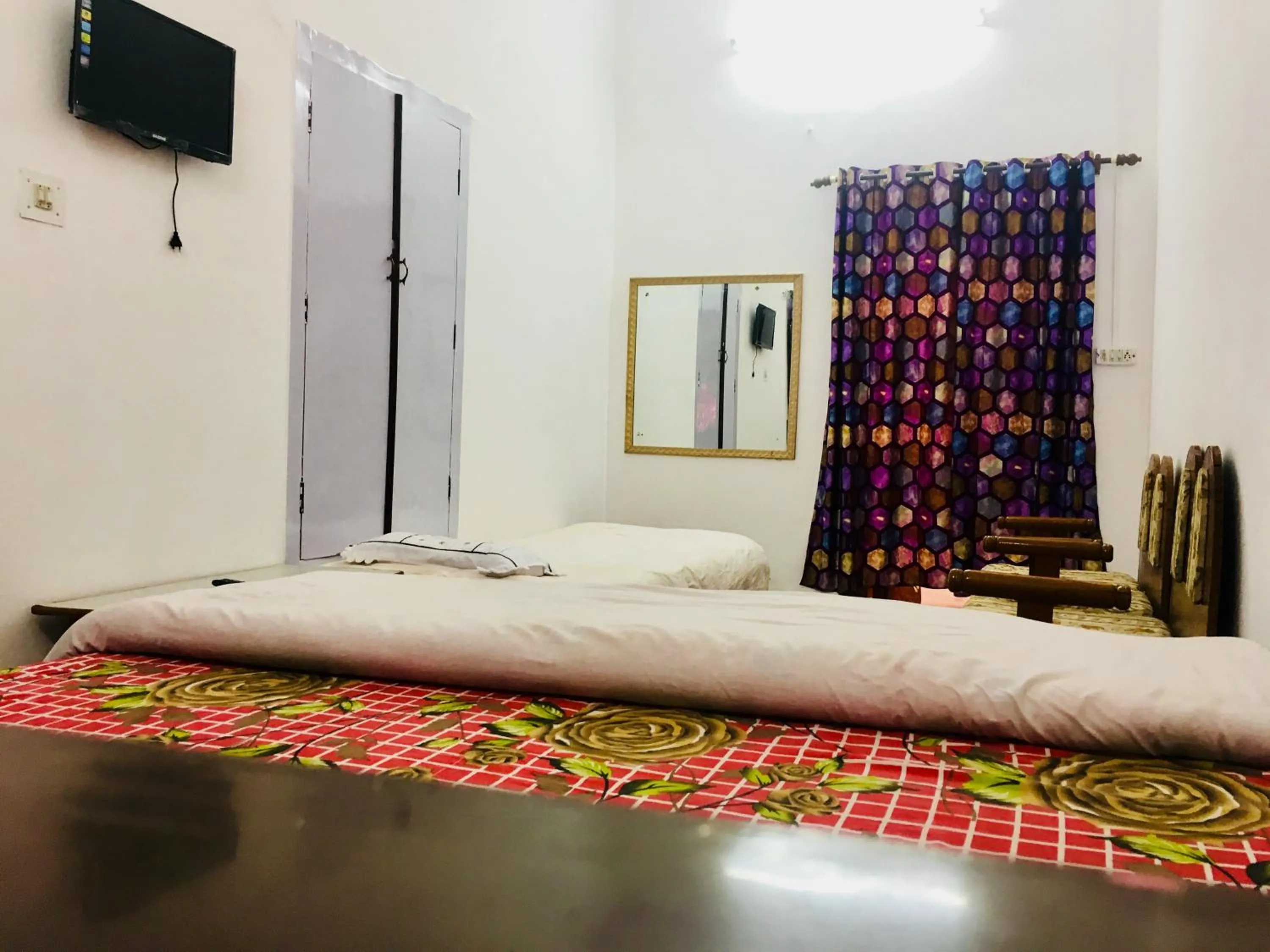 Bed in Hotel Heritage Sanyam