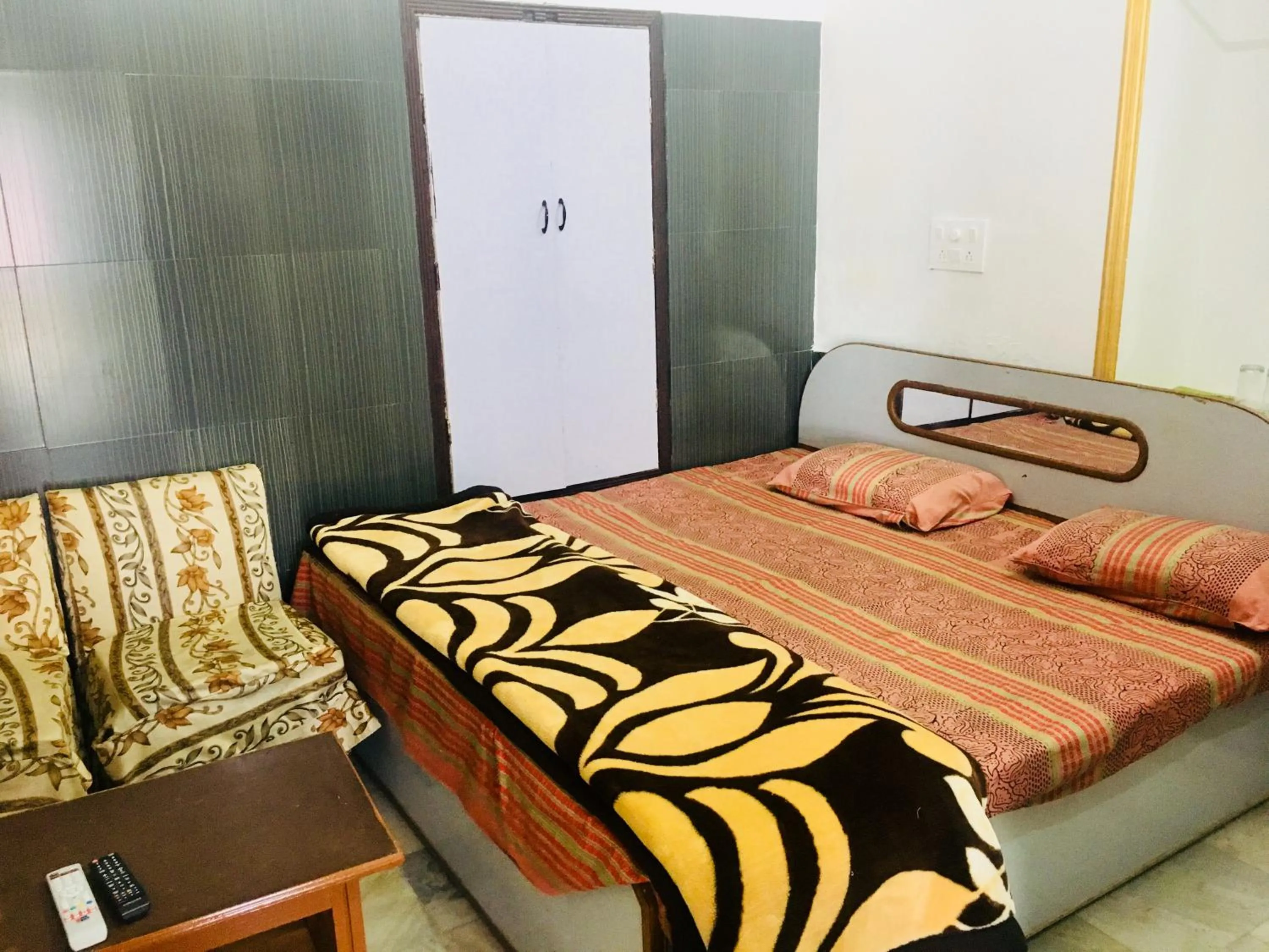 Bed in Hotel Heritage Sanyam