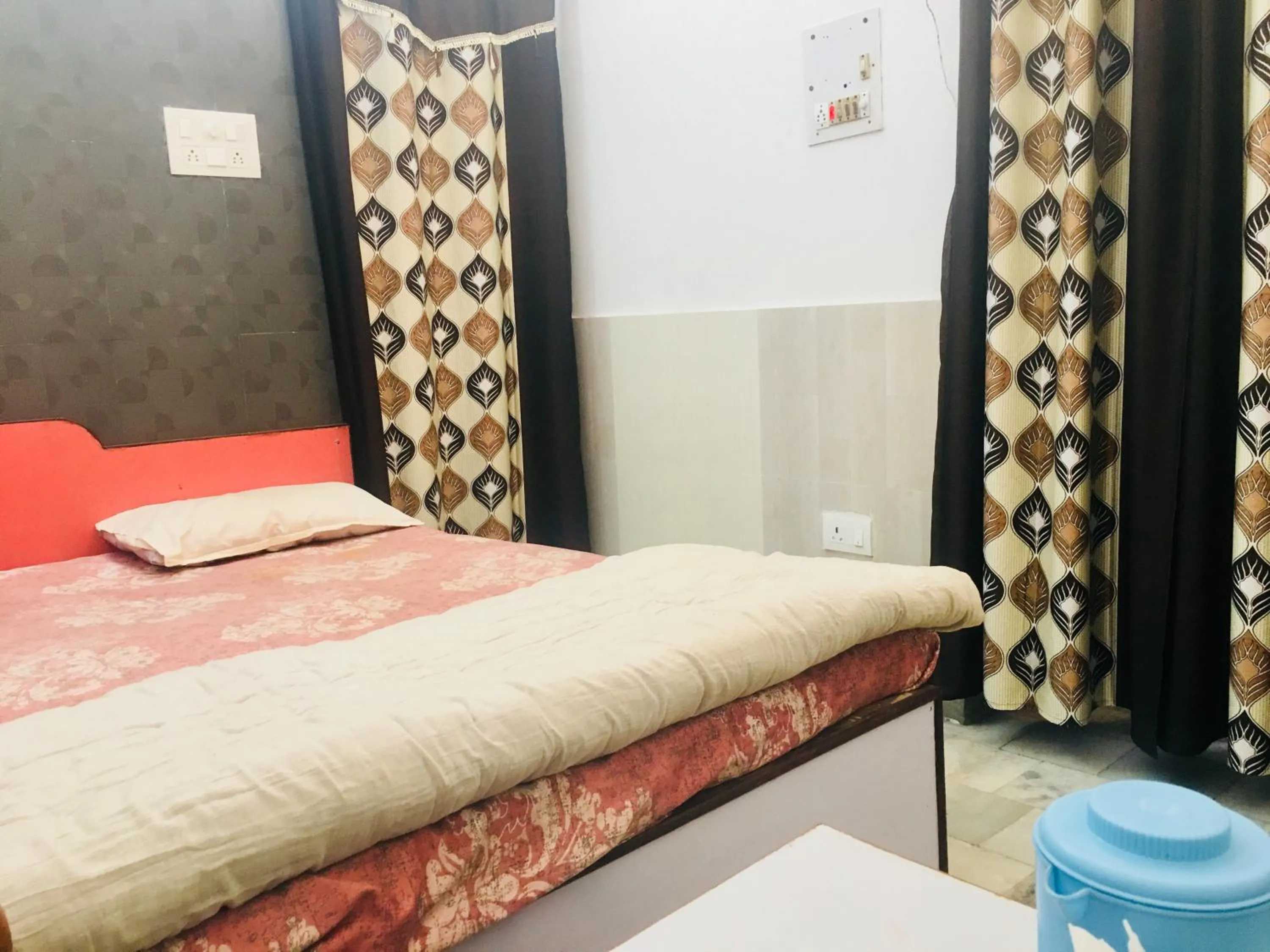 Bed in Hotel Heritage Sanyam