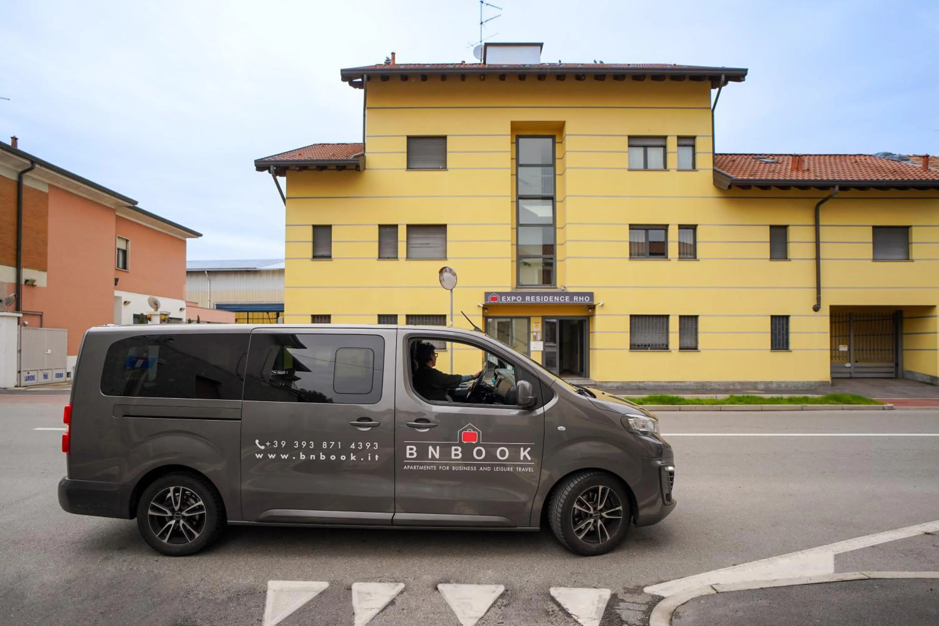 Property building in Bnbook Expo Residence Rho