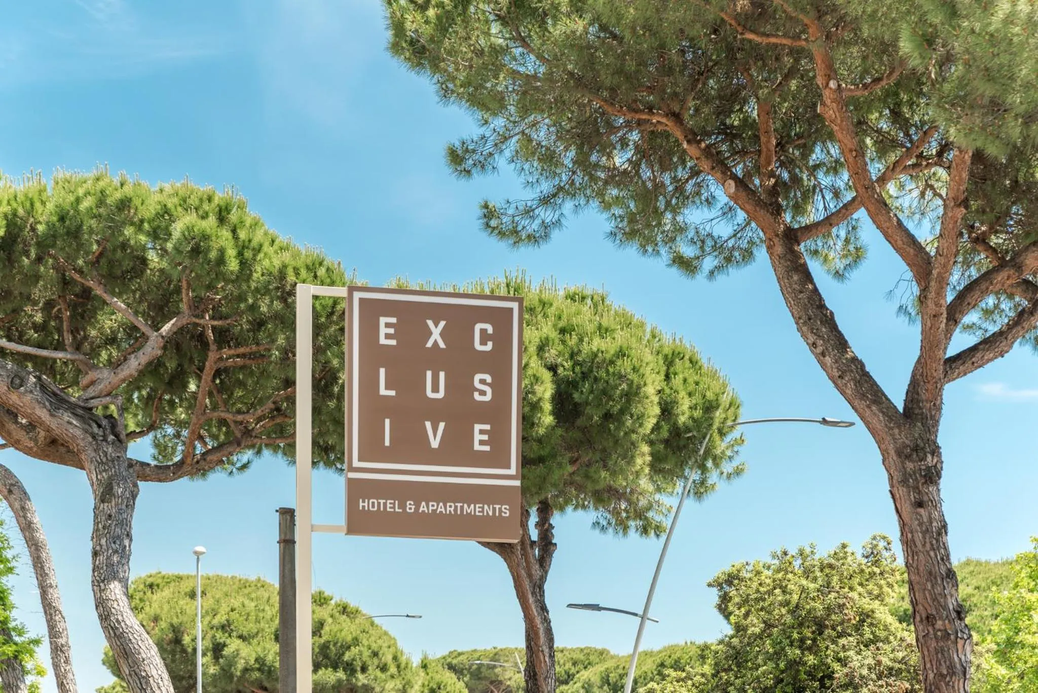 Property logo or sign in Hotel & Residence Exclusive