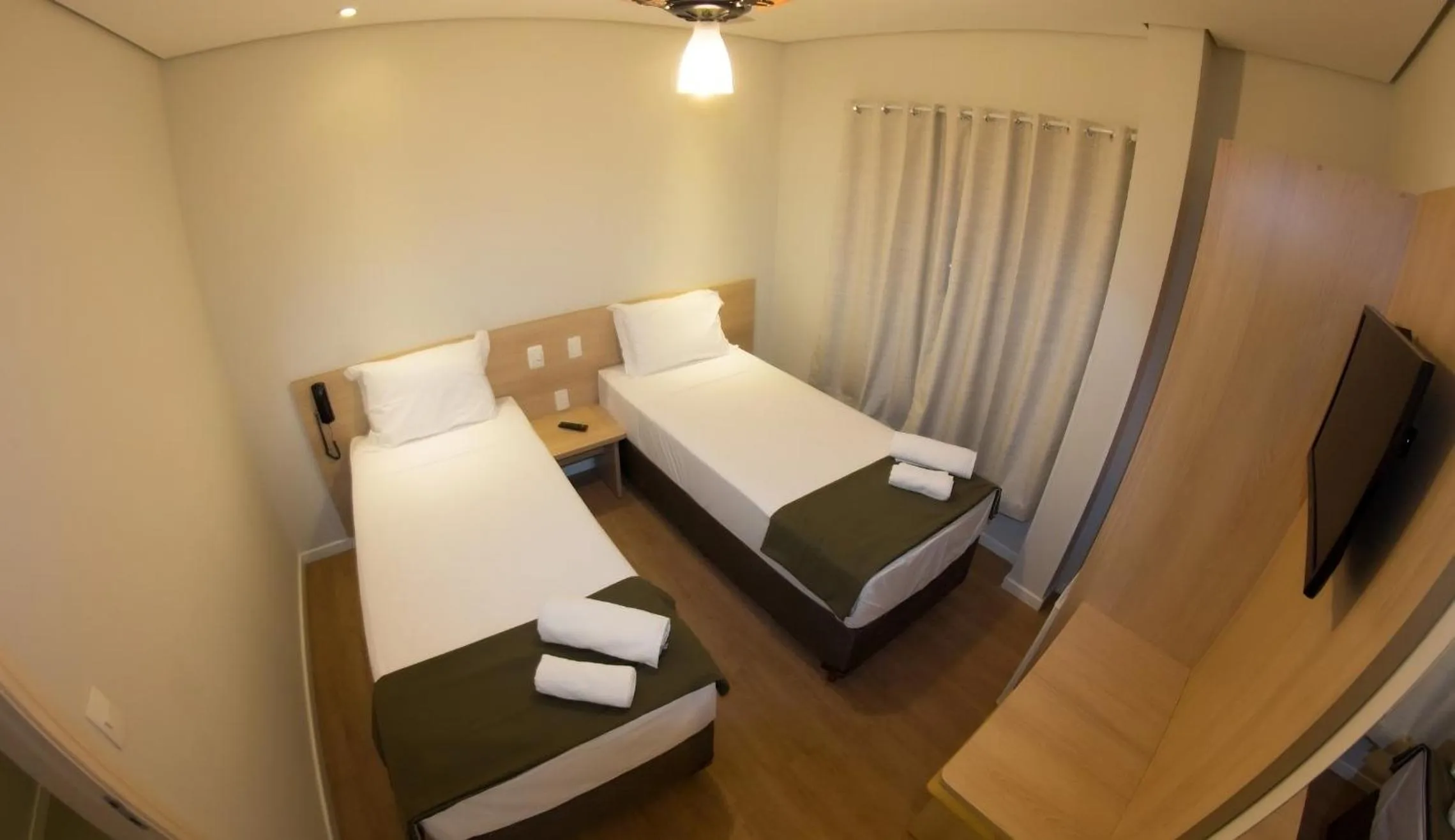 Bed in Hotel Toyo Inn