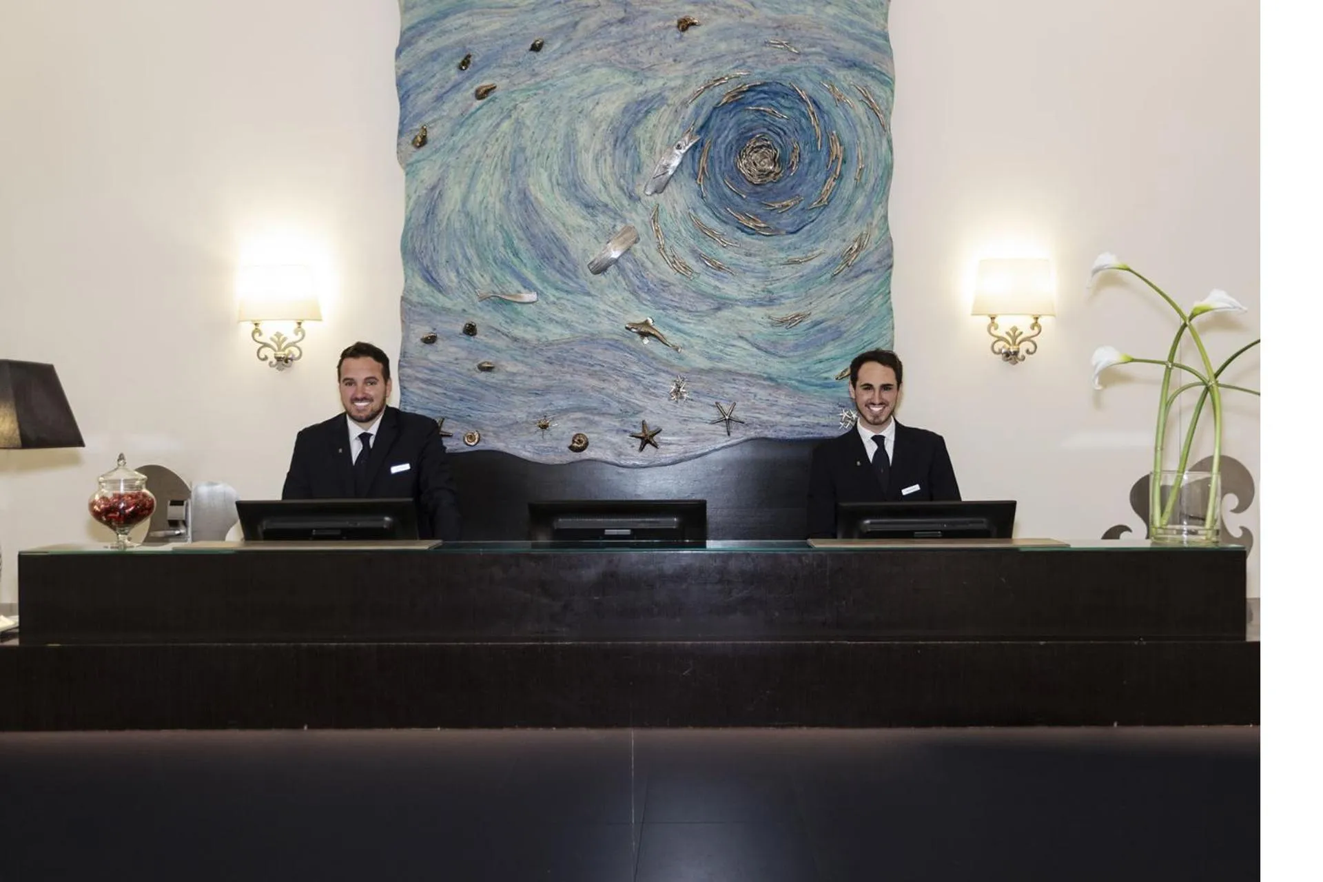 Staff in Palazzo Caracciolo Naples