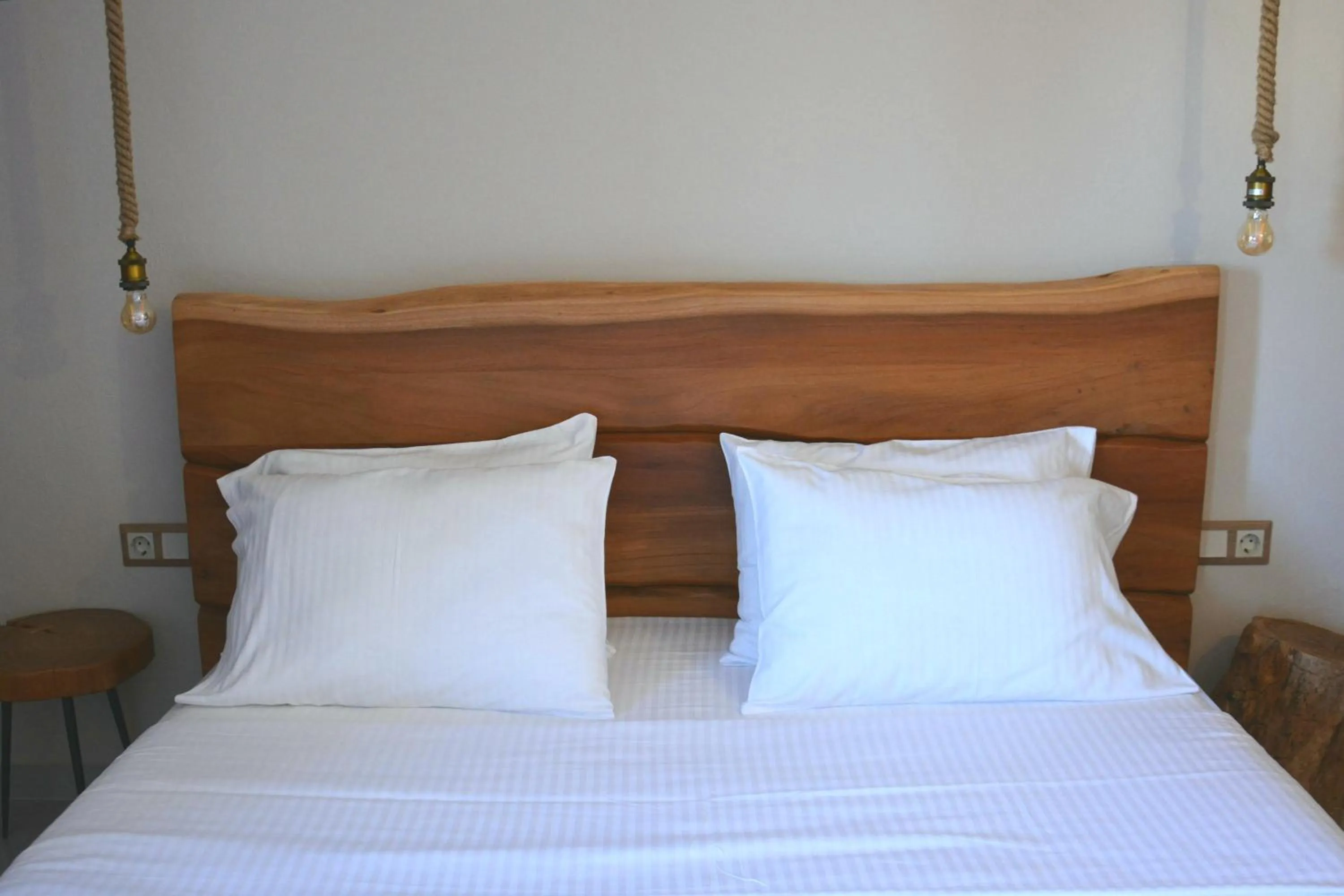 Bed in Sunrise Hotel