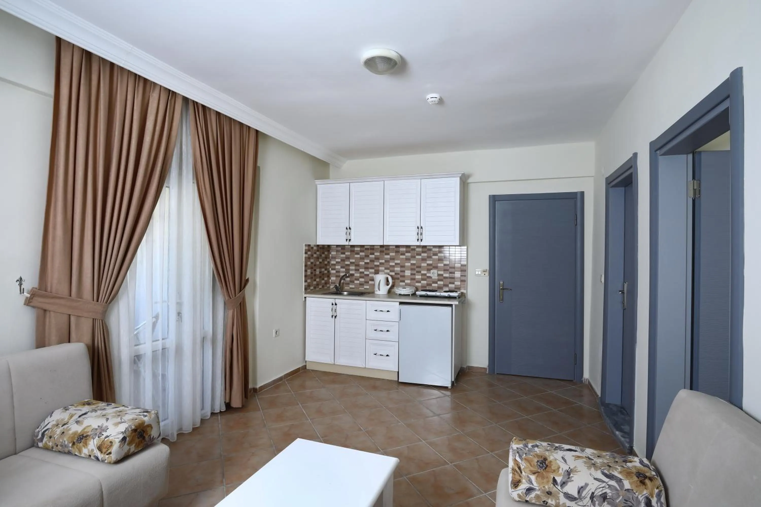 Kitchen or kitchenette in Summer Garden Suites Beach Hotel