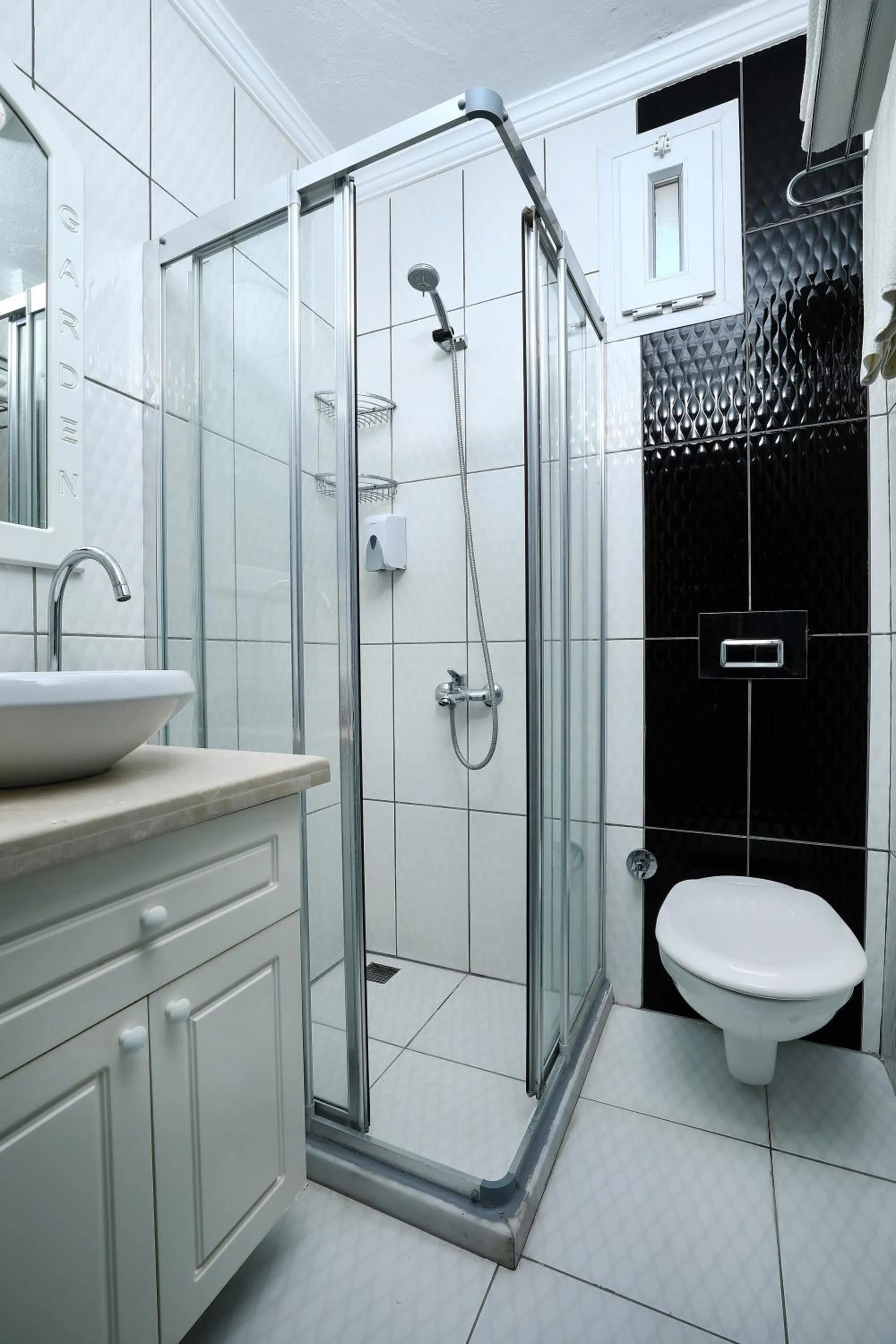 Shower in Summer Garden Suites Beach Hotel