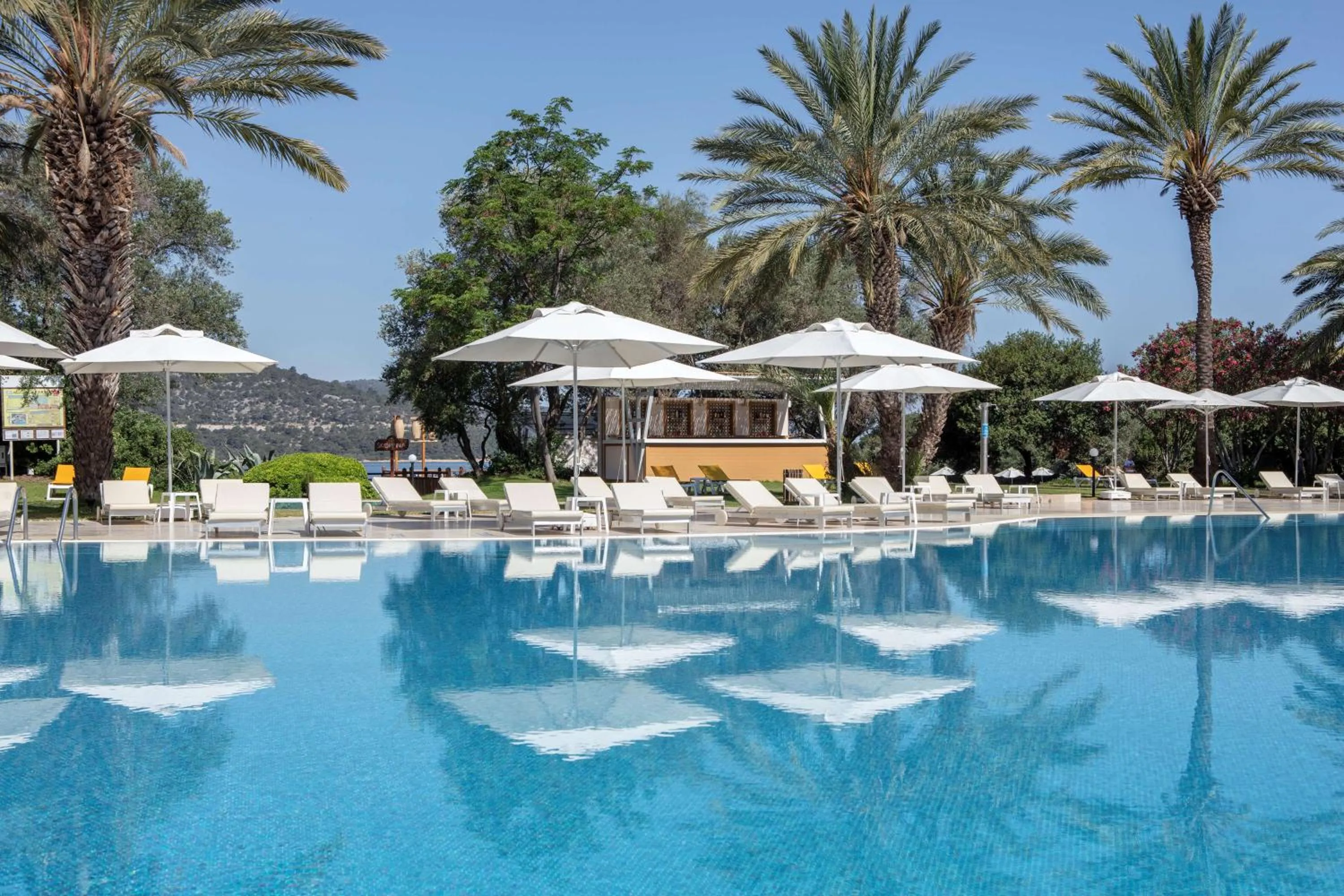 Pool view in DoubleTree by Hilton Bodrum Isil Club Ultra All-Inclusive Resort