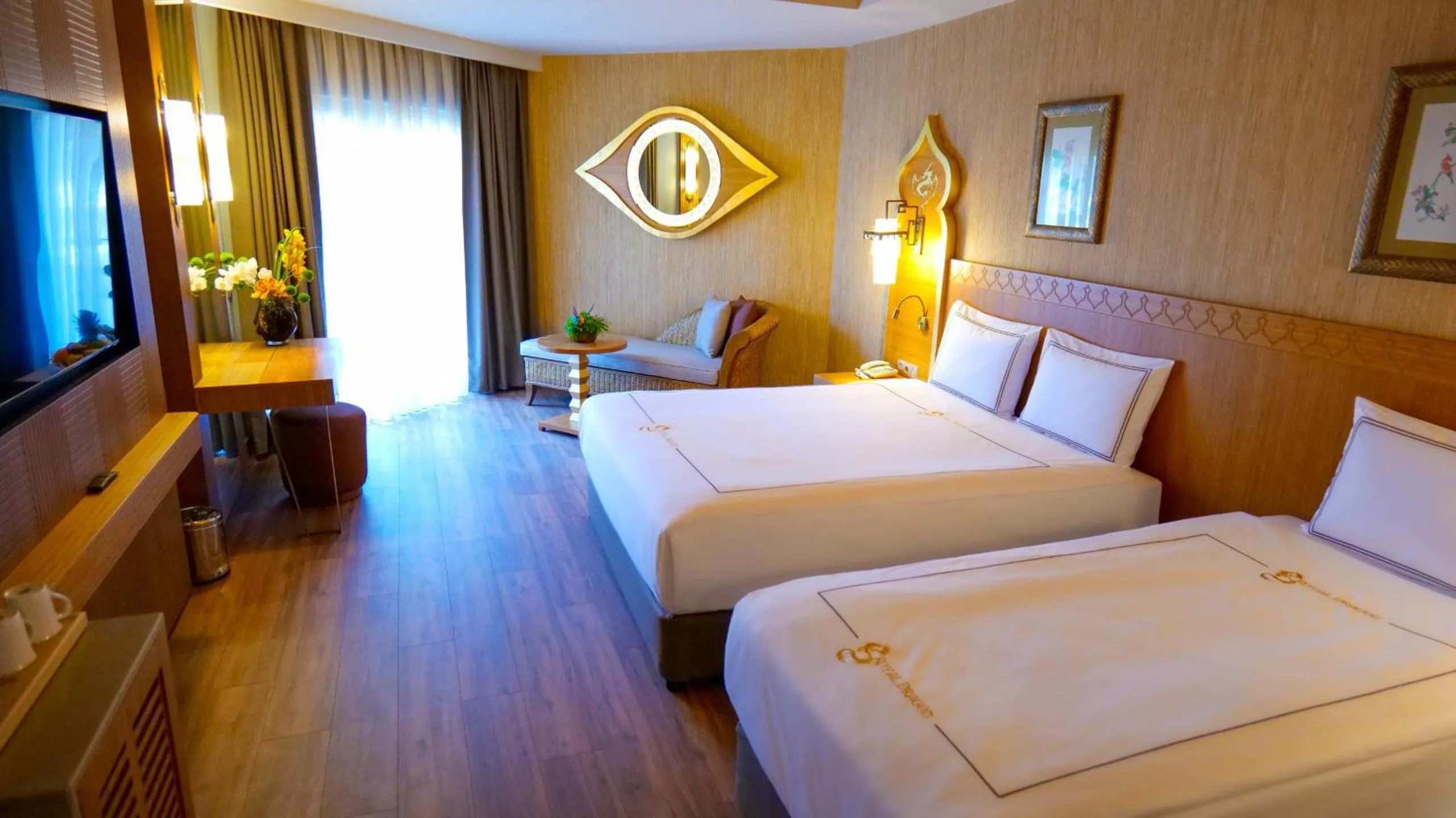 Bed in Royal Dragon Hotel