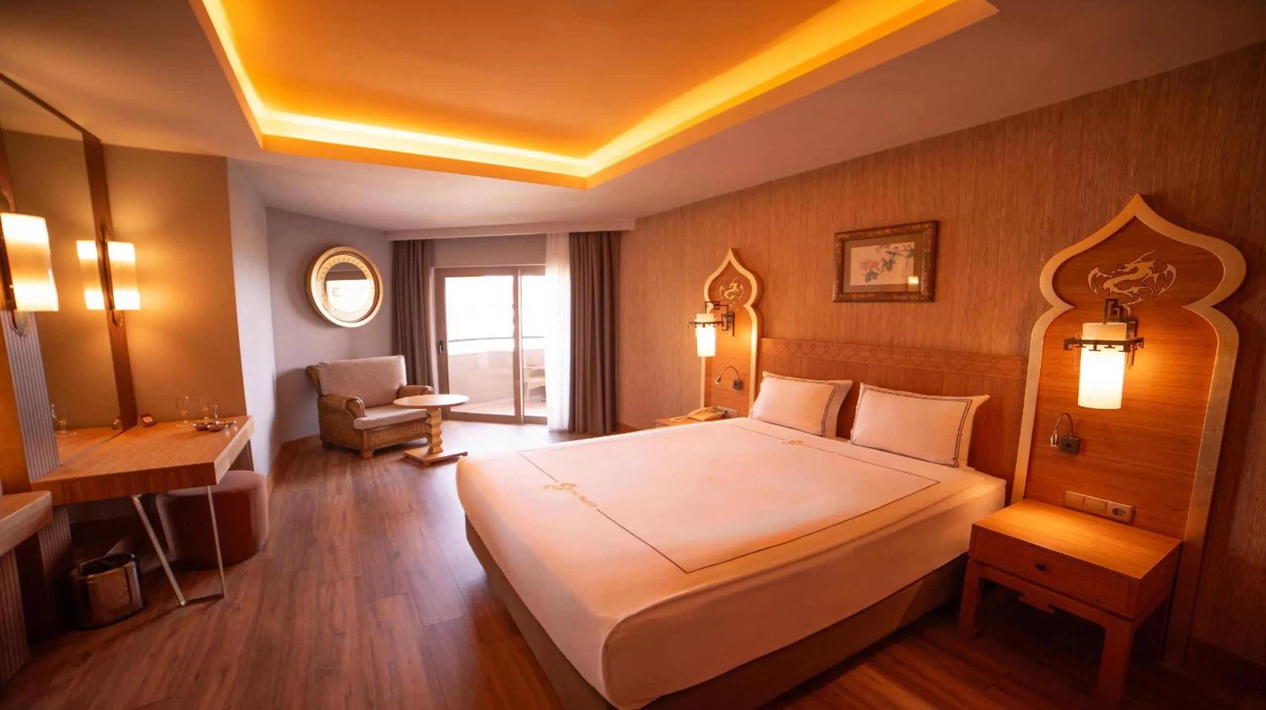 Bed in Royal Dragon Hotel