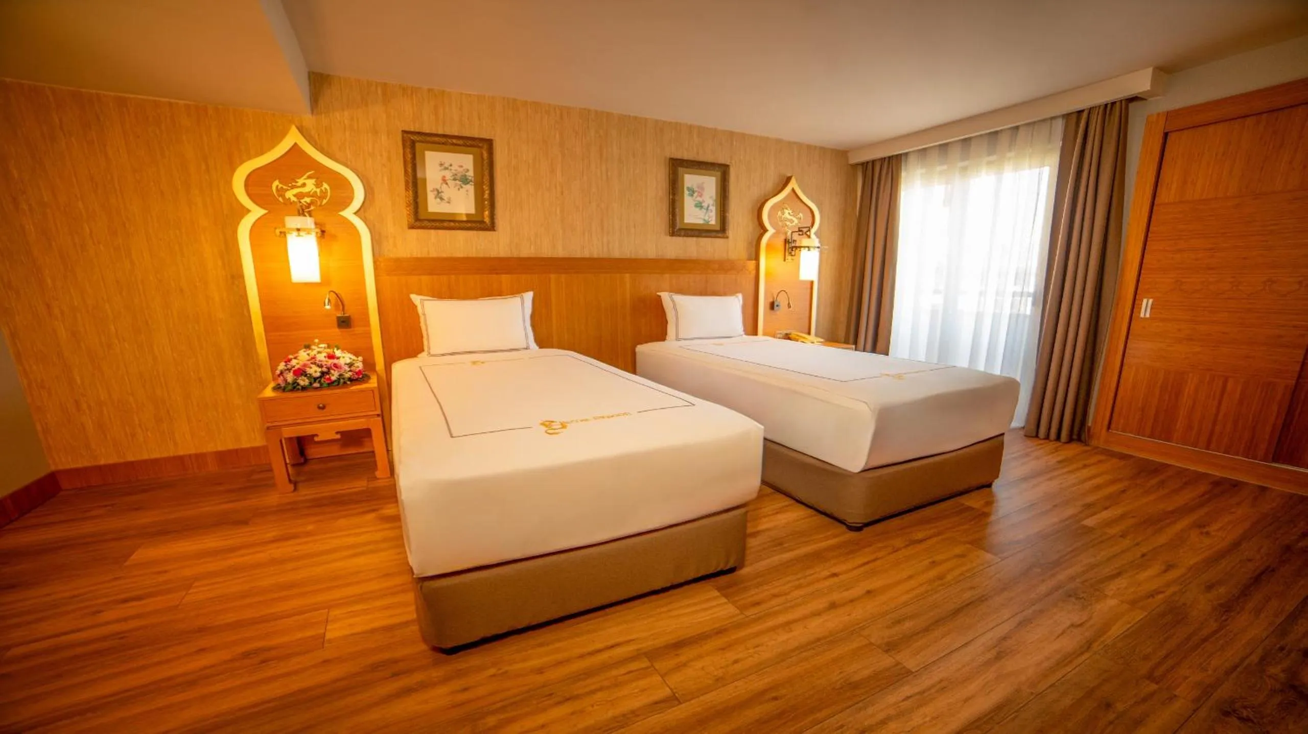 Bed in Royal Dragon Hotel