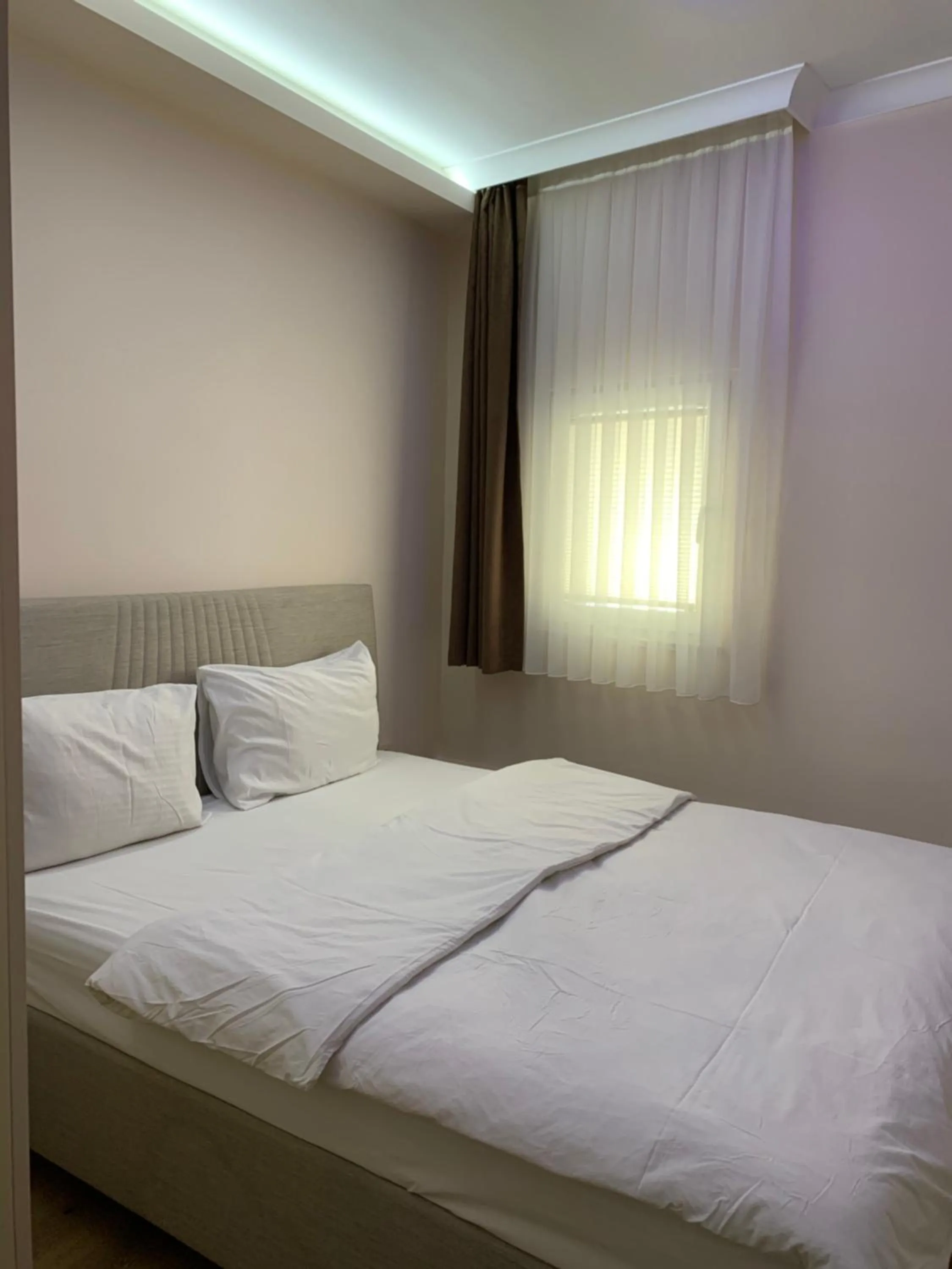 Bed in Esa Apart Hotel