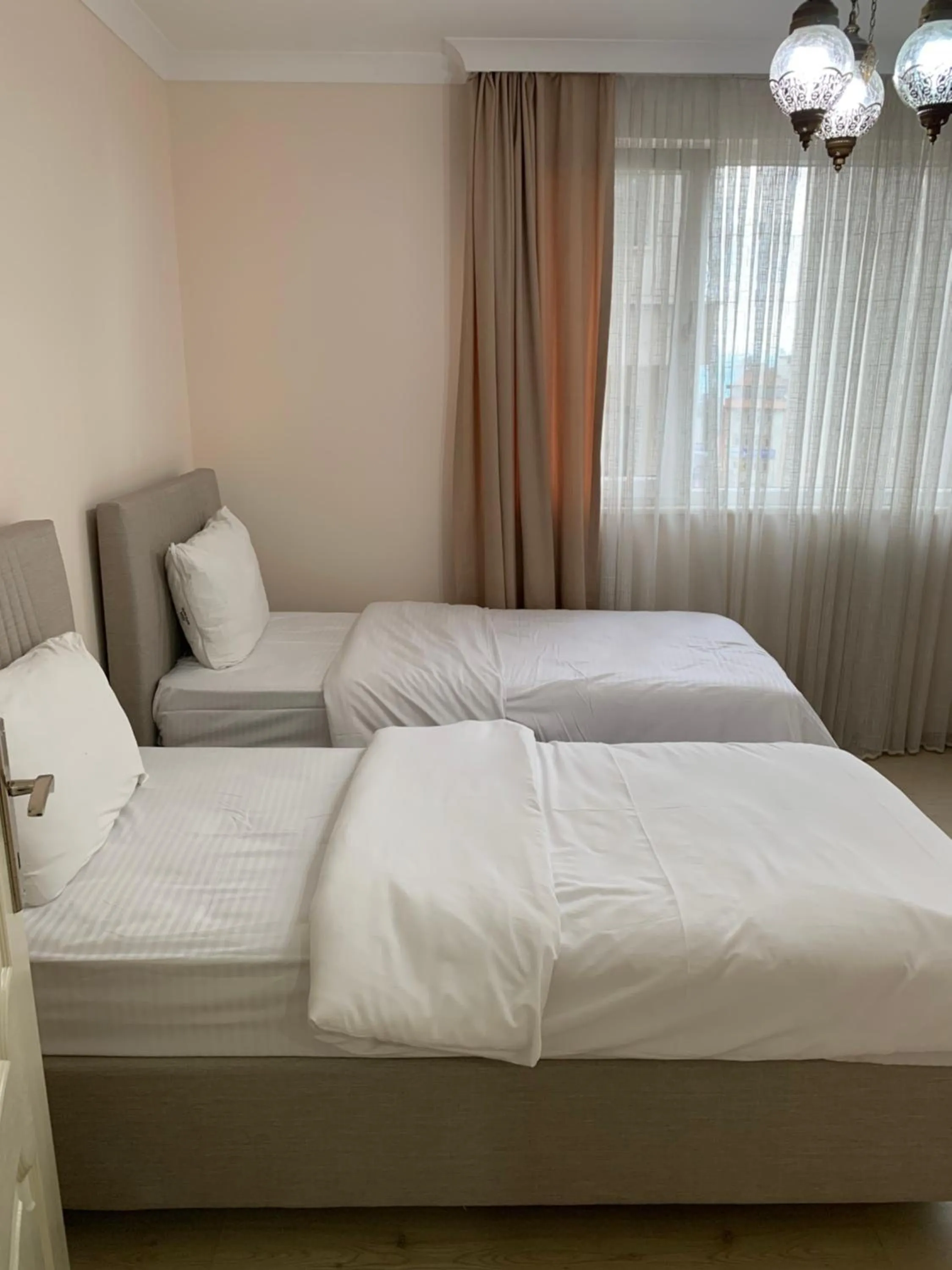 Bed in Esa Apart Hotel