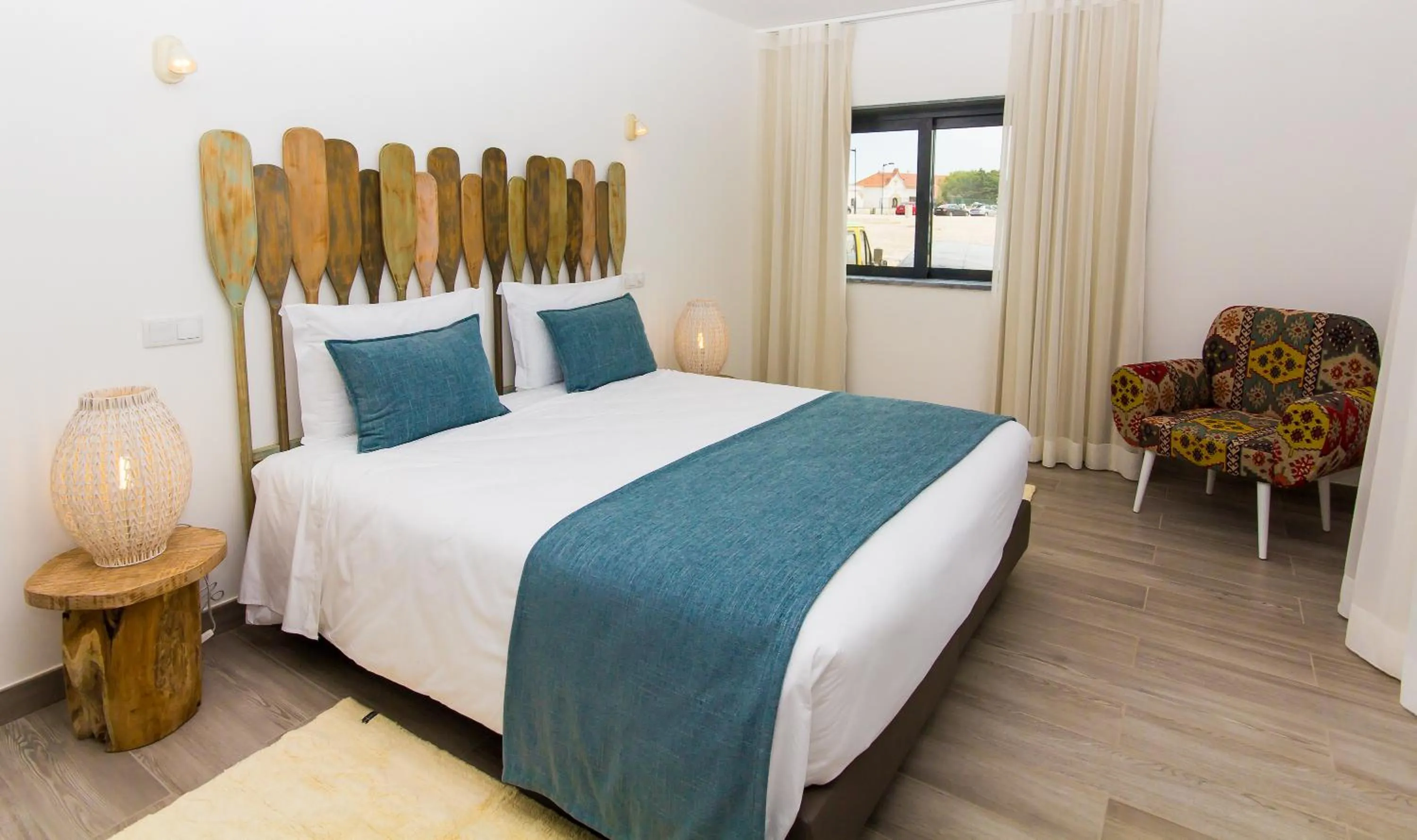 Bed in Mareta Beach House - Boutique Residence