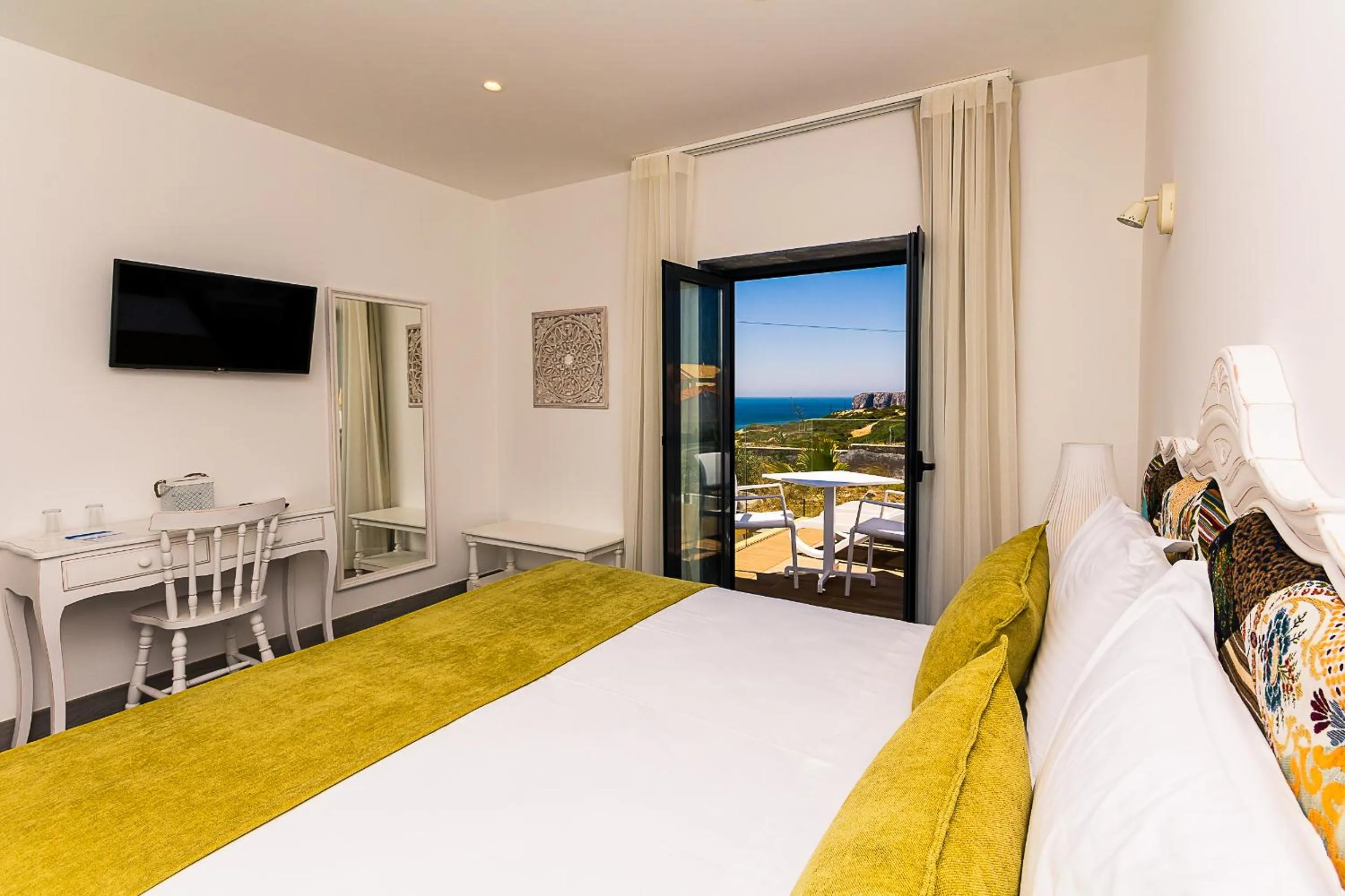 Bed in Mareta Beach House - Boutique Residence