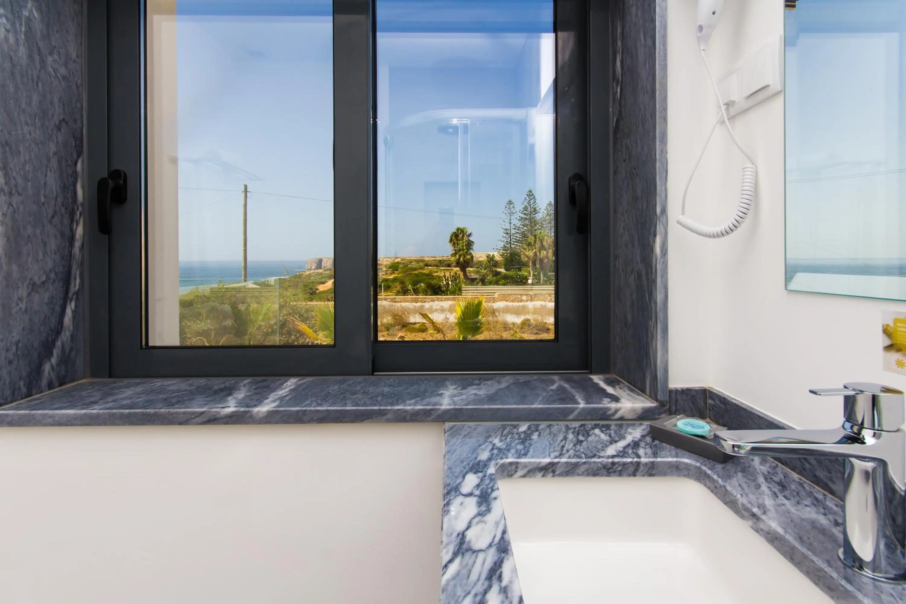 Toilet in Mareta Beach House - Boutique Residence