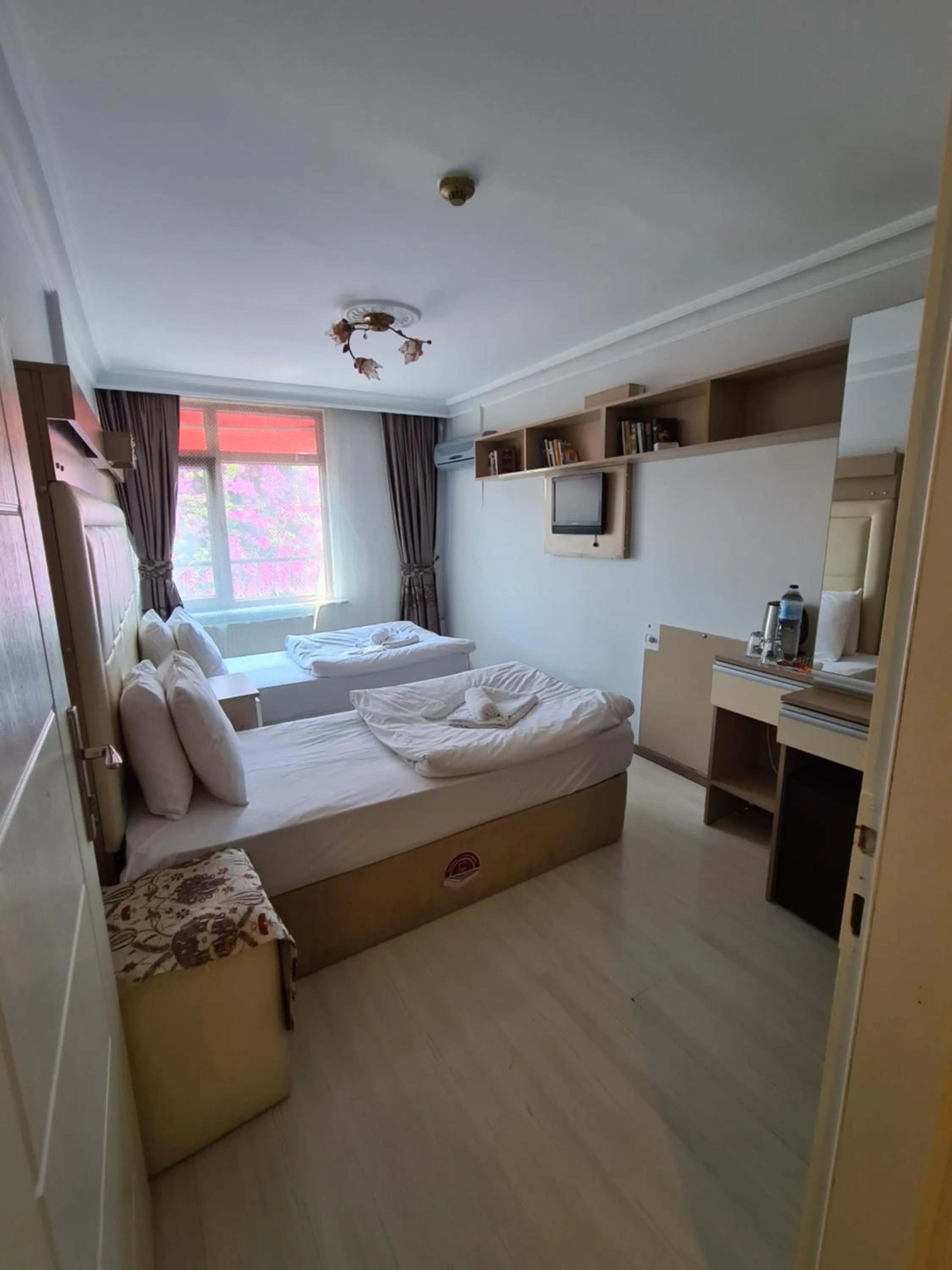 Bed in Oceans 7 Hotel