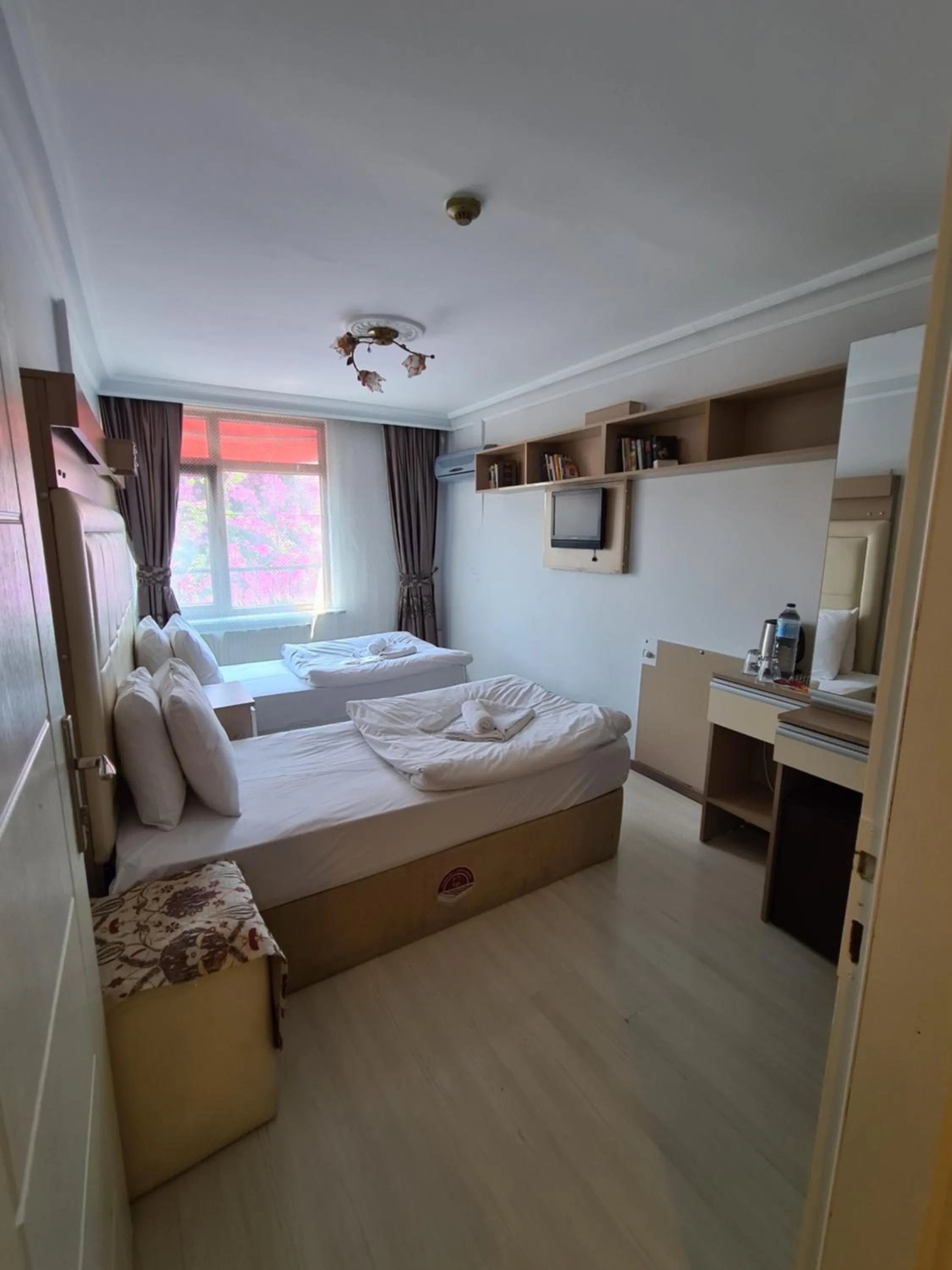 Bed in Oceans 7 Hotel