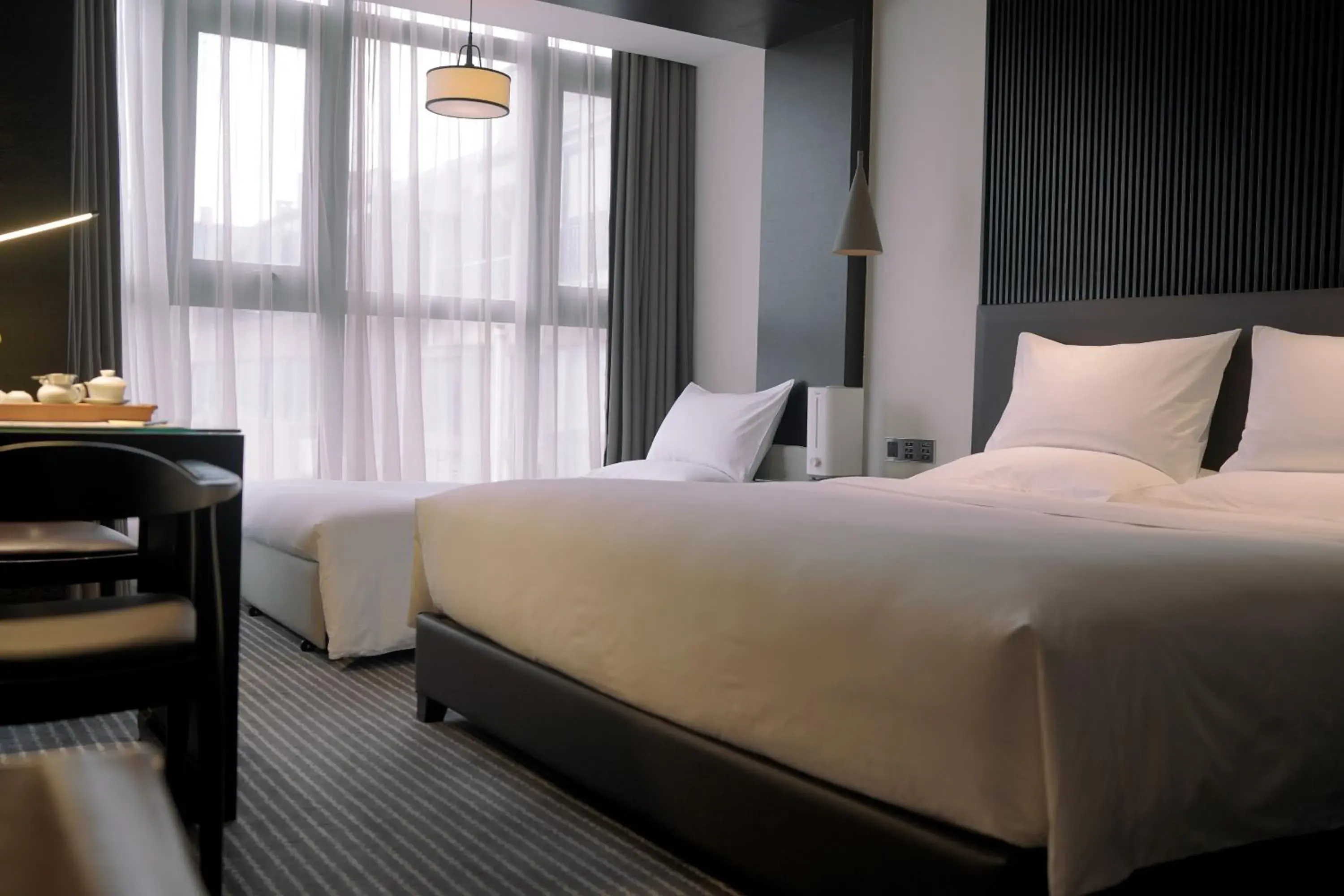 Deluxe Family Room with One King Bed and One Sofa Bed in Eastern House Xi'an Deluxe Family Room with One King Bed and One Sofa Bed in Eastern House Xi'an