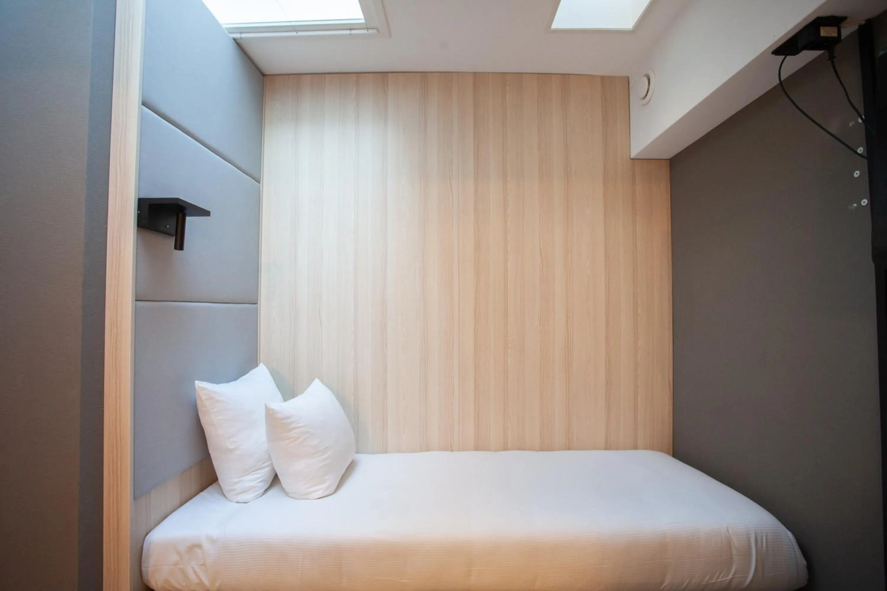 Bed in The Alfred Hotel