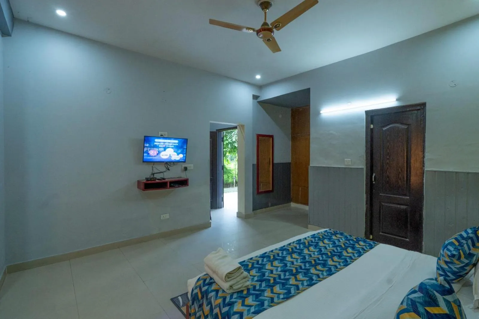 Communal lounge/ TV room, Bed in Corbett Treat Resort By Atya Hotels