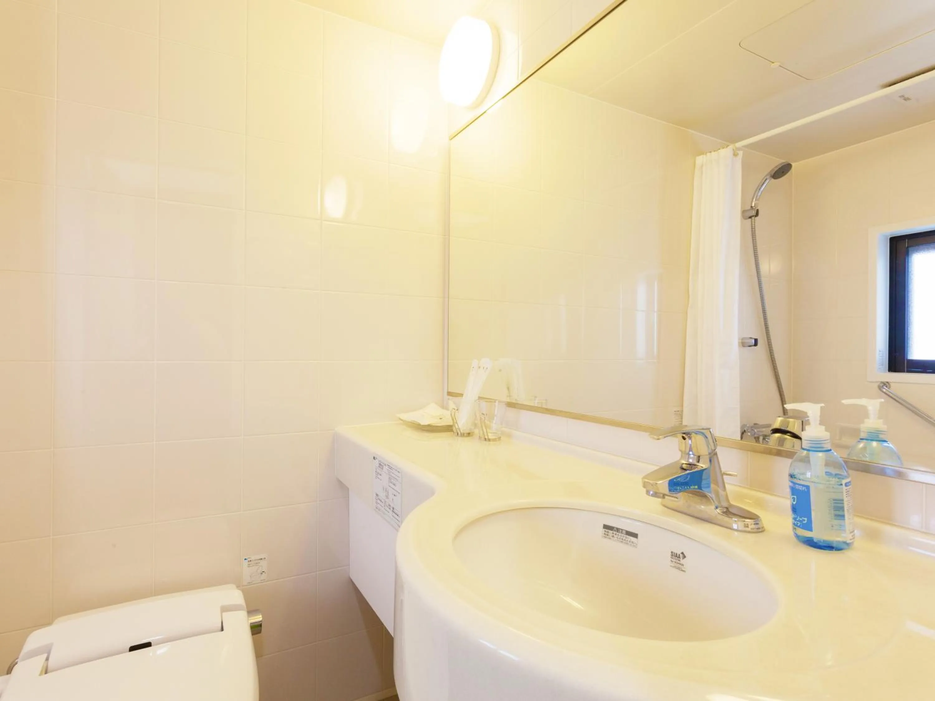 Bathroom in Kariyushi Condominium Ocean Hills Chouraku Stay