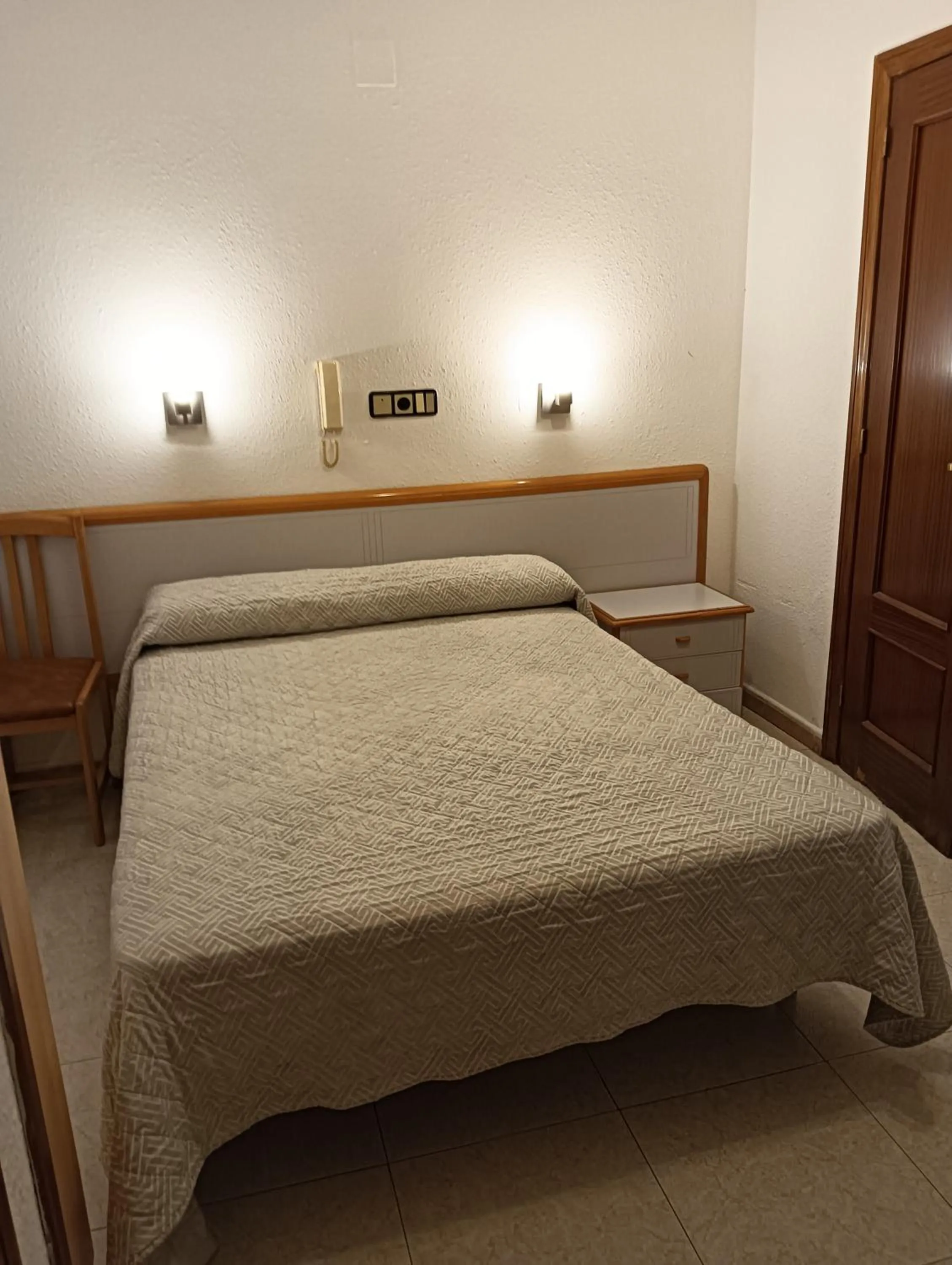 Bed in Hostal Lizana 2