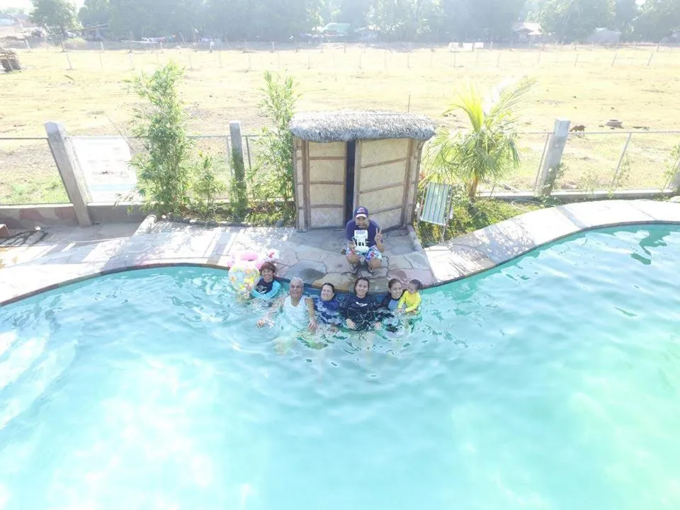 Swimming pool in Calayo Beach Resort