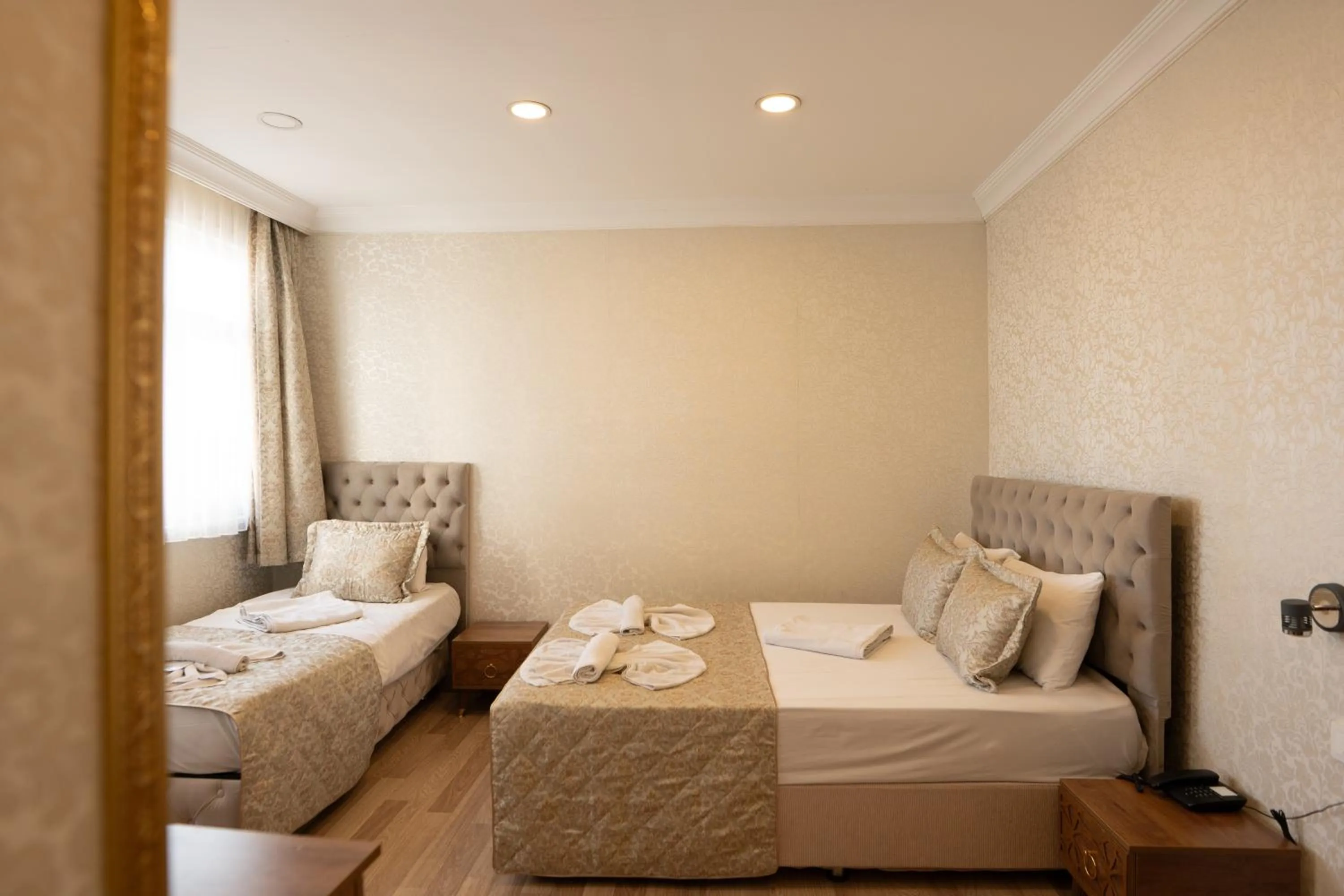 Photo of the whole room, Bed in Angels Garden Hotel - Special Catagory