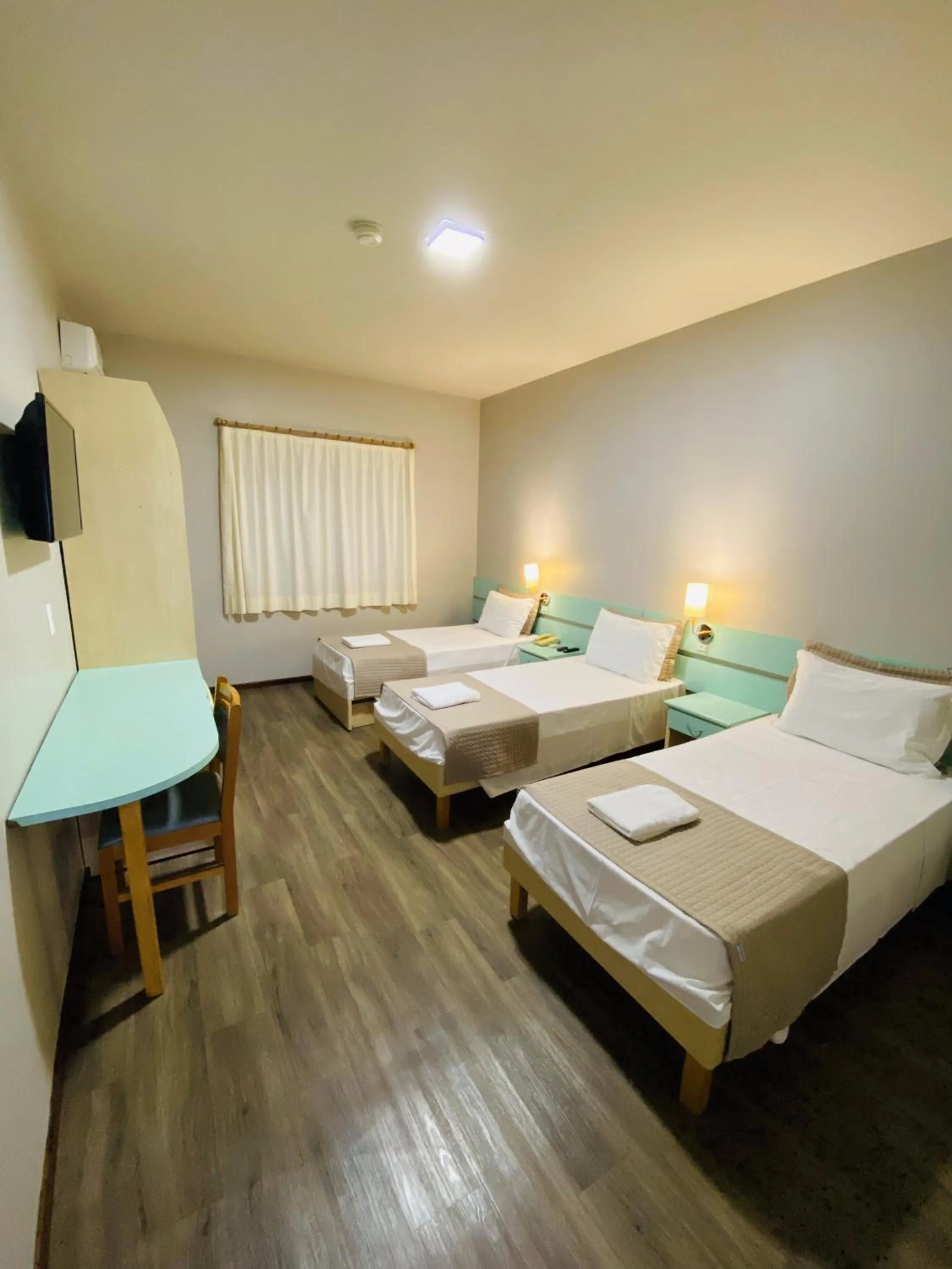 Bed in Real NOB Hotel