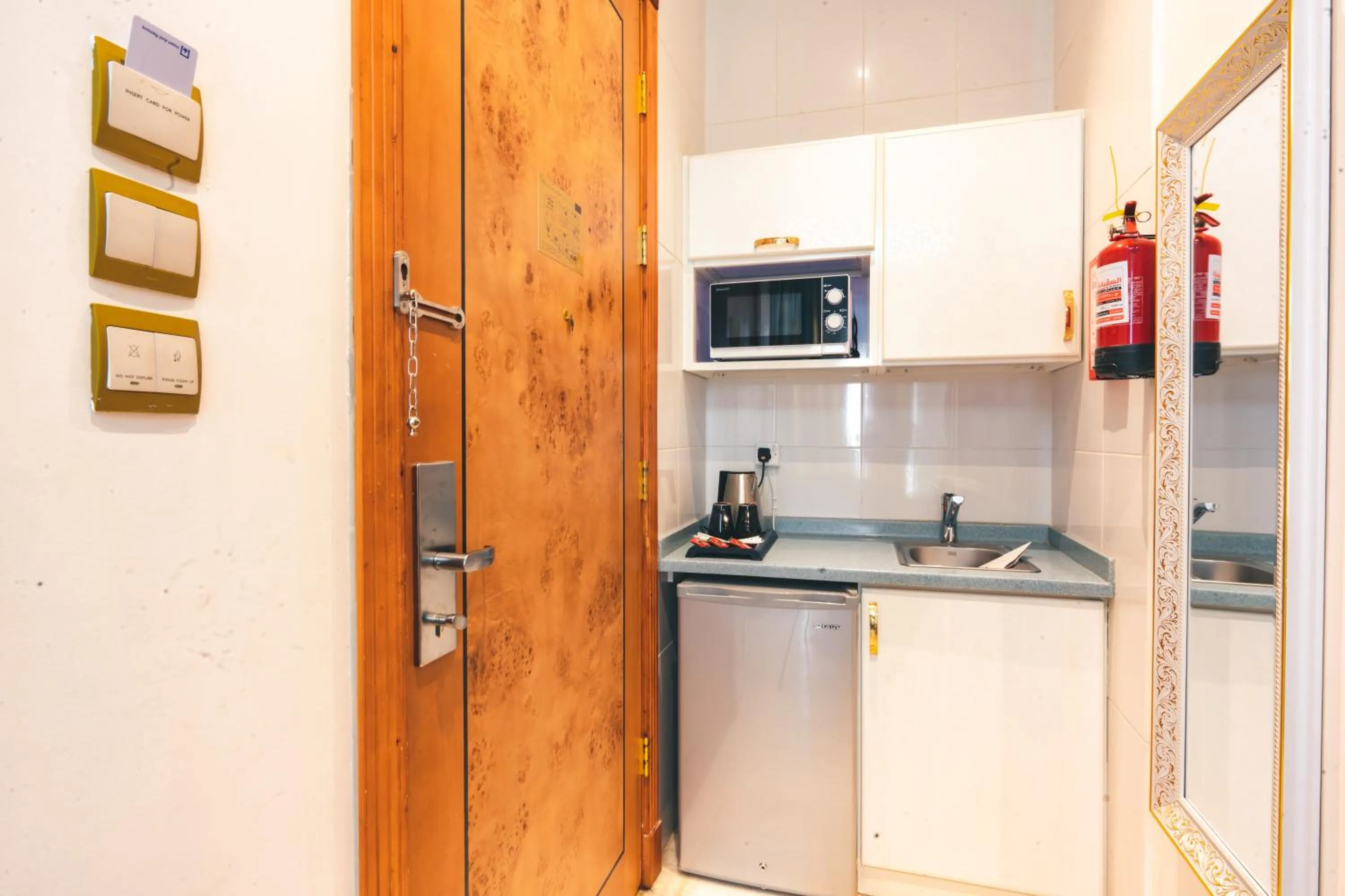 Kitchen or kitchenette in Platinum Al Khamseen Serviced Apartments