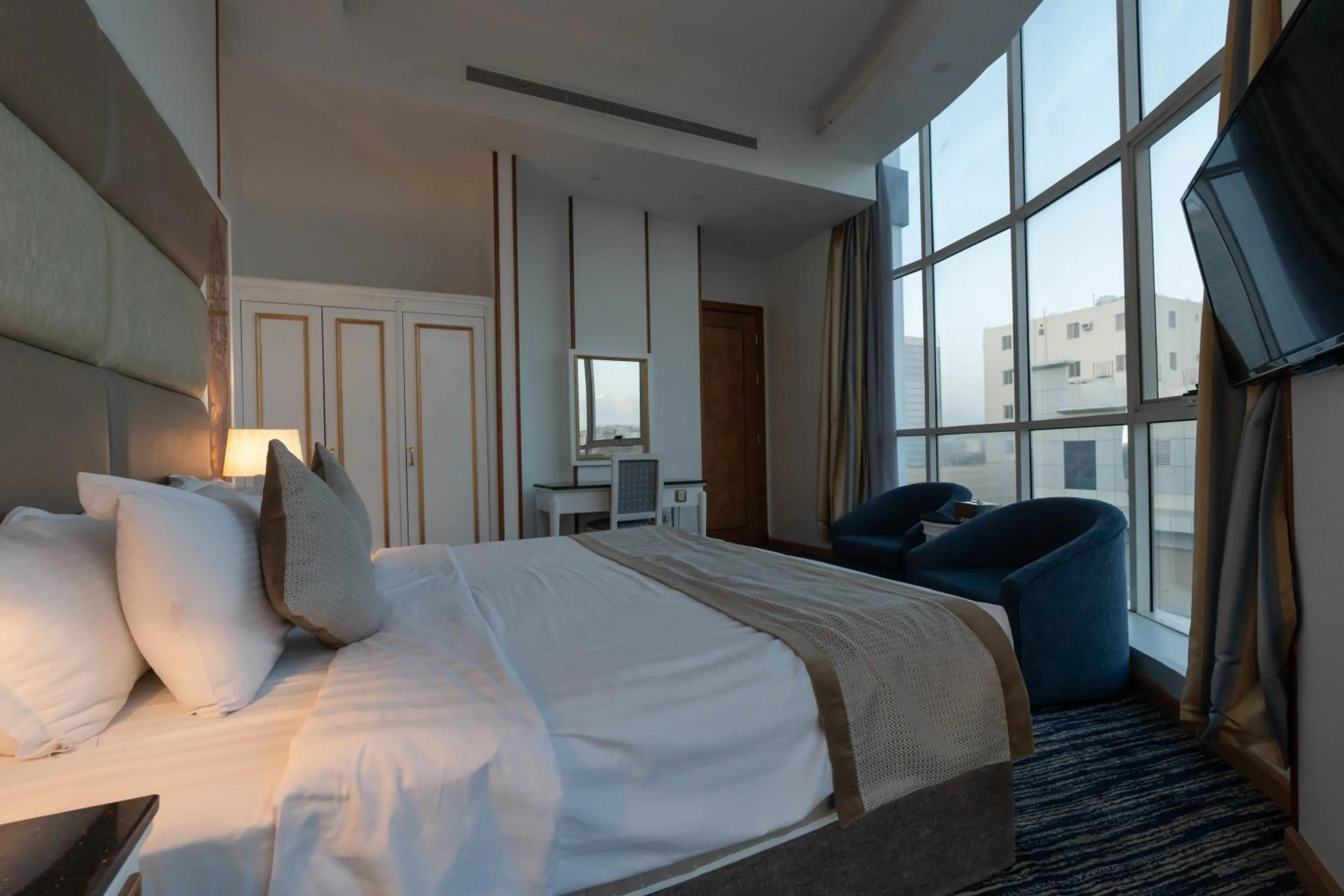 Communal lounge/ TV room, Bed in Platinum Al Khamseen Serviced Apartments