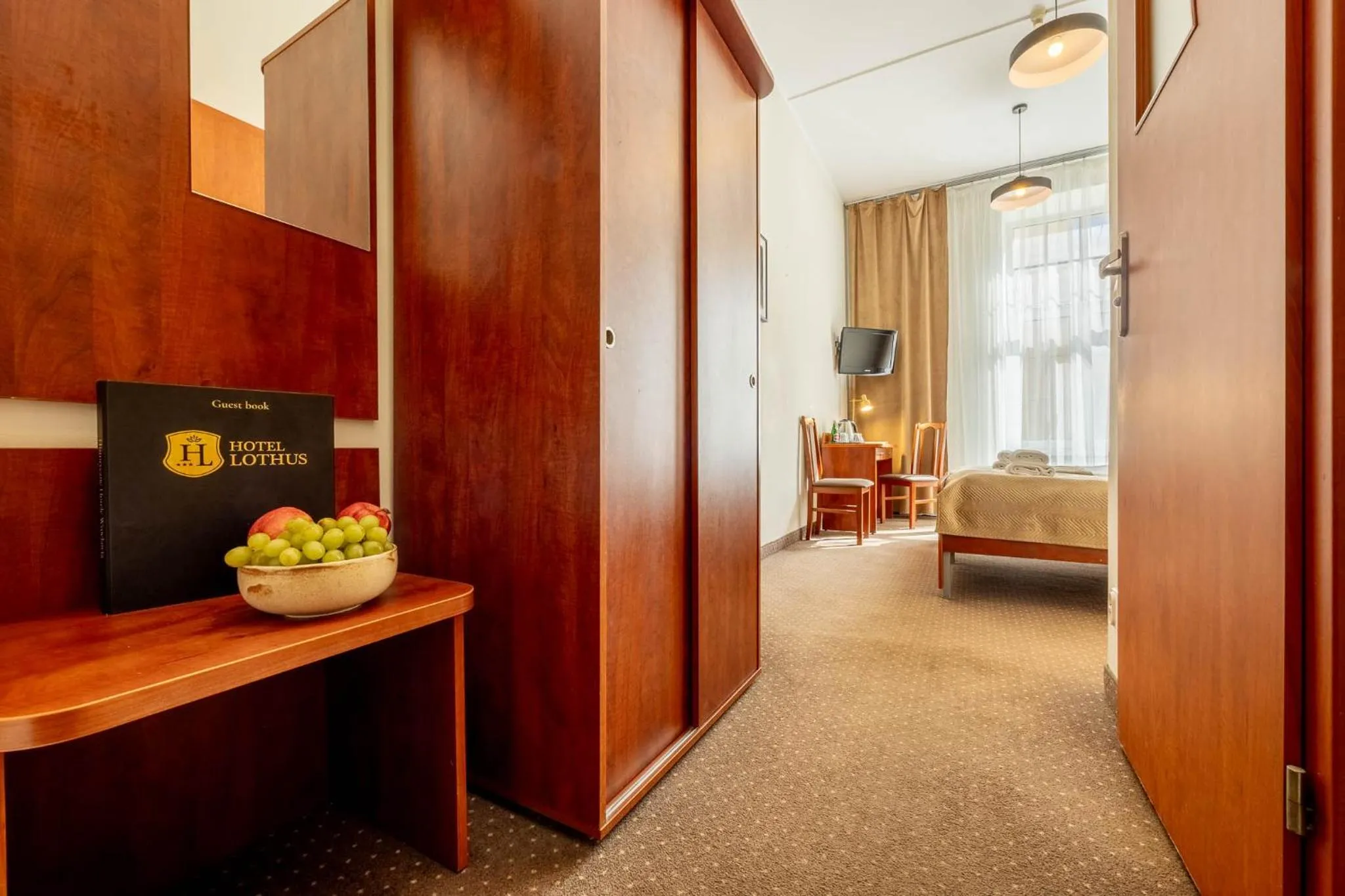 wardrobe, Bed in Hotel Lothus