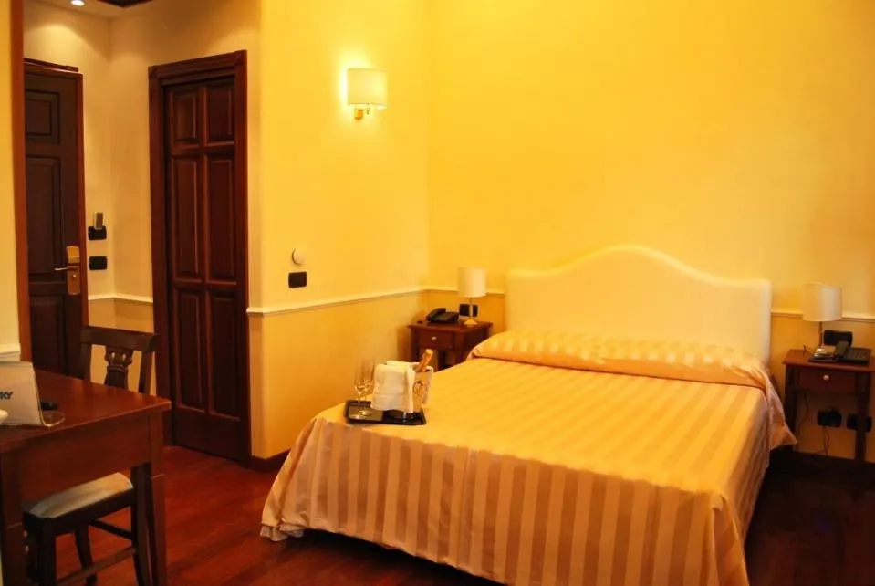 Bed in Luxury Ludovisi Rooms