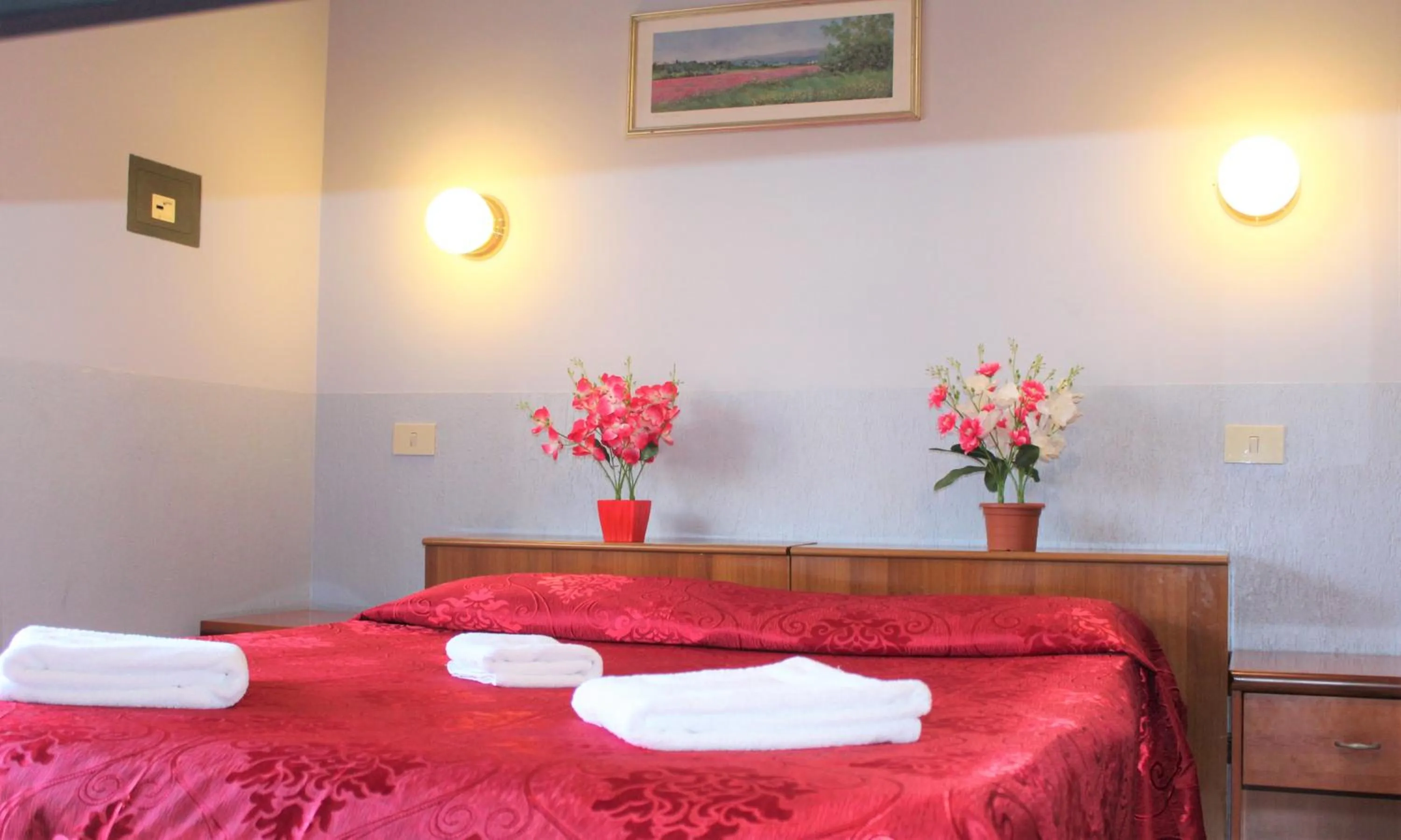 Bed in Hotel Eurorooms